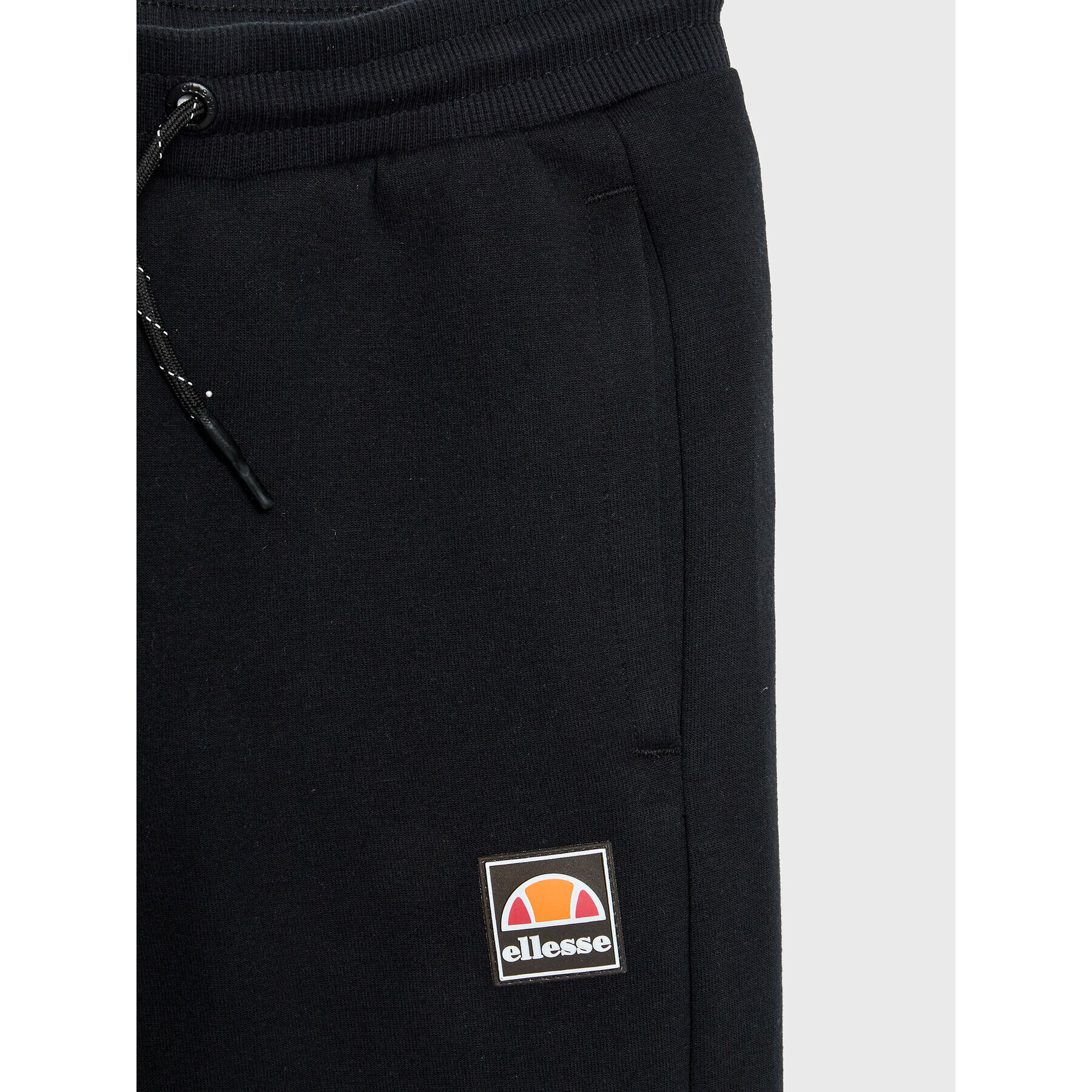 Ellesse Teplákové kalhoty Eventa Jnr S3P16425 Černá Regular Fit - Pepit.cz