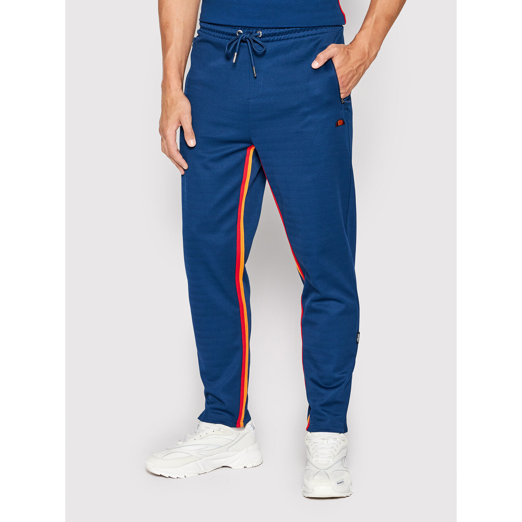 Ellesse Teplákové kalhoty Jaino Track SHN15080 Tmavomodrá Regular Fit - Pepit.cz