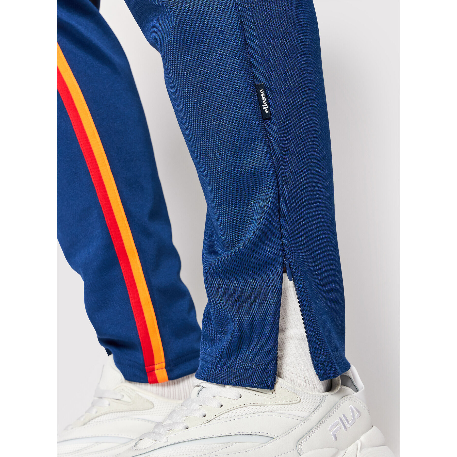 Ellesse Teplákové kalhoty Jaino Track SHN15080 Tmavomodrá Regular Fit - Pepit.cz