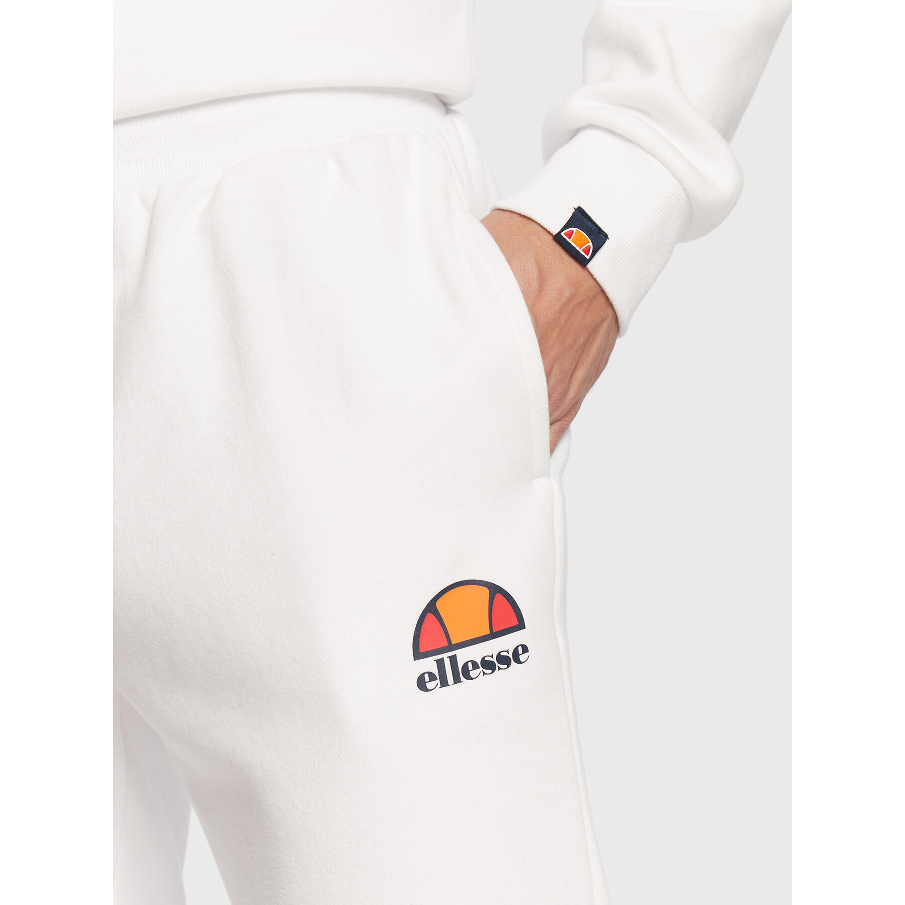 Ellesse Teplákové kalhoty Ovest SHS01763 Bílá Regular Fit - Pepit.cz