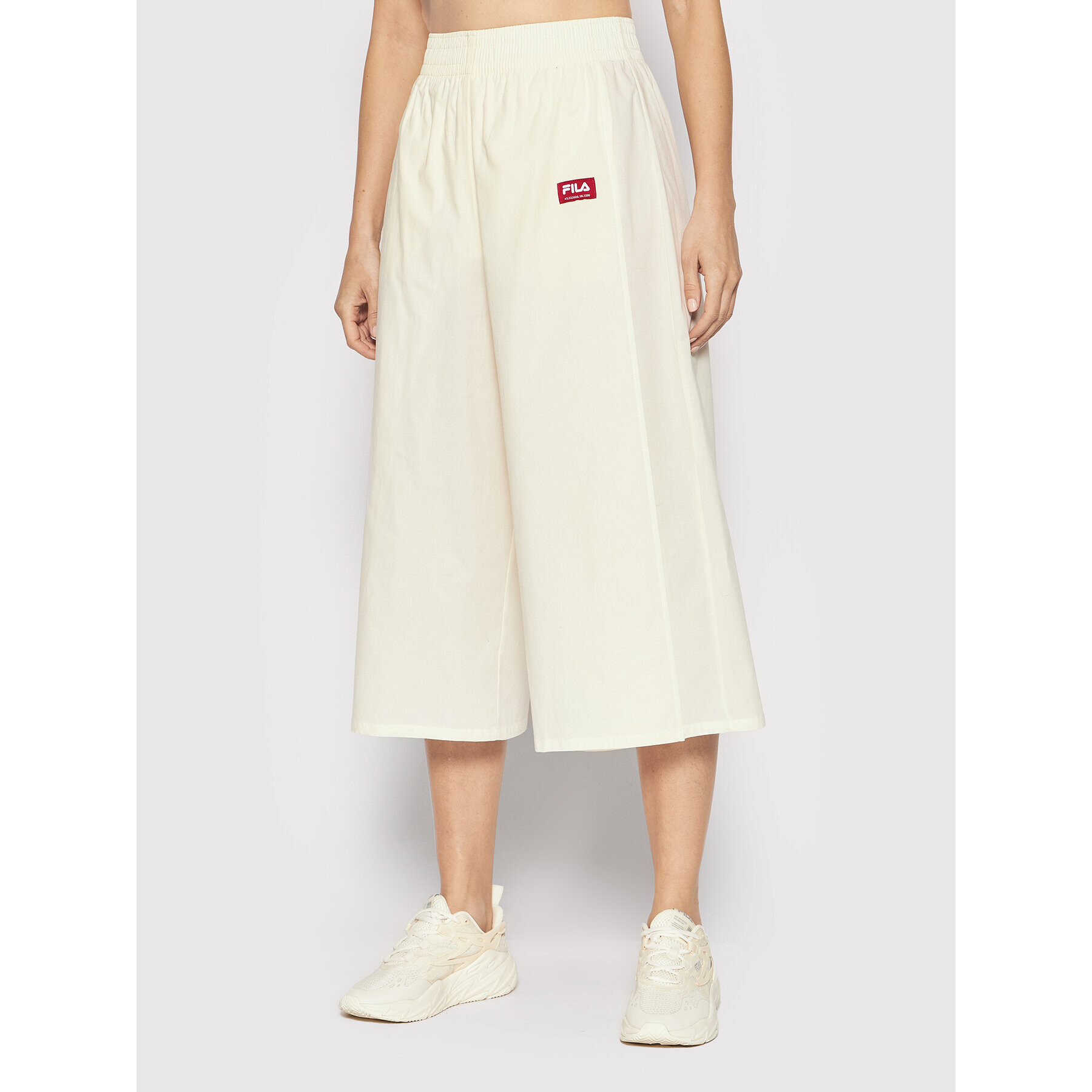 Fila Kalhoty culottes Terme FAW0015 Béžová Relaxed Fit - Pepit.cz