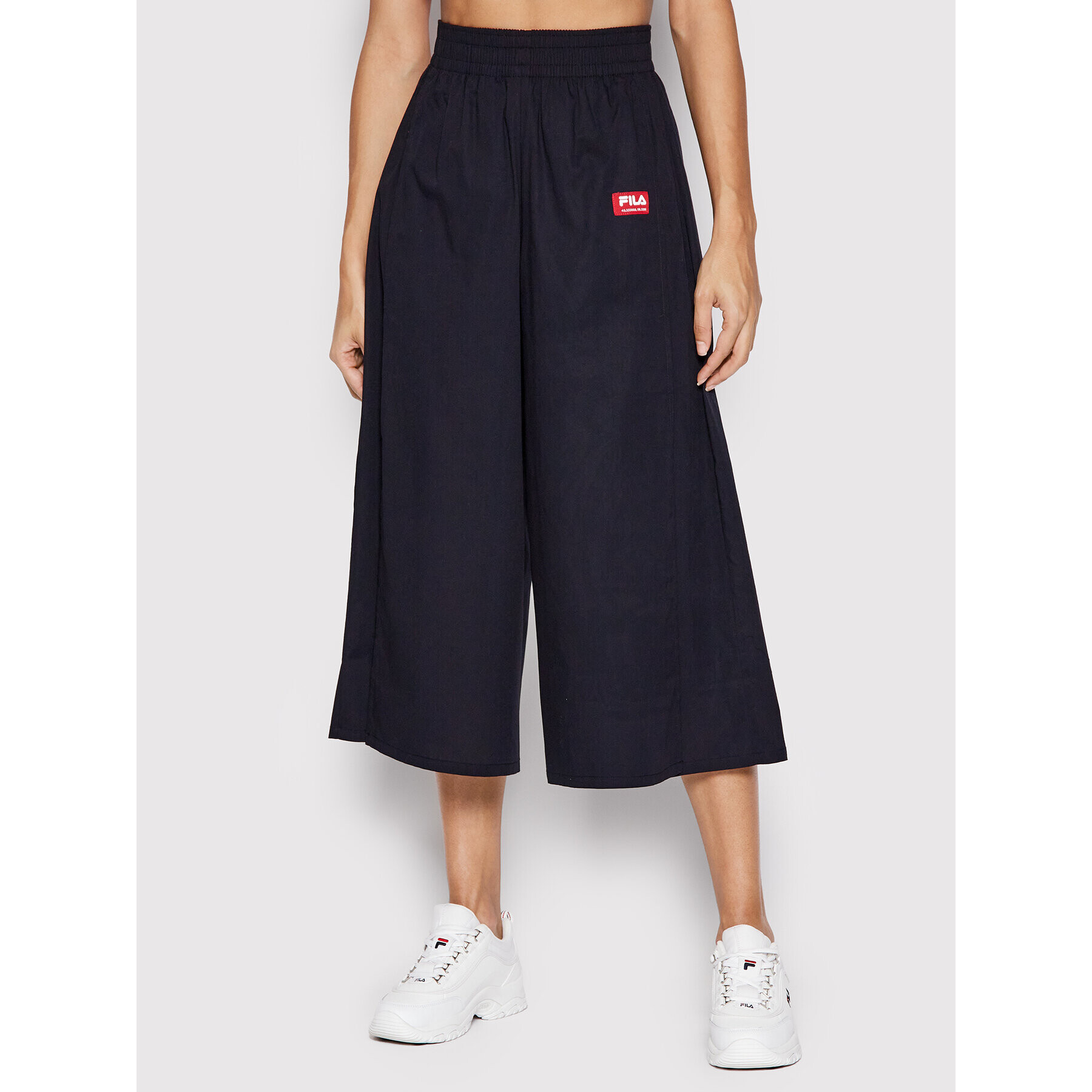 Fila Kalhoty culottes Terme FAW0015 Černá Relaxed Fit - Pepit.cz