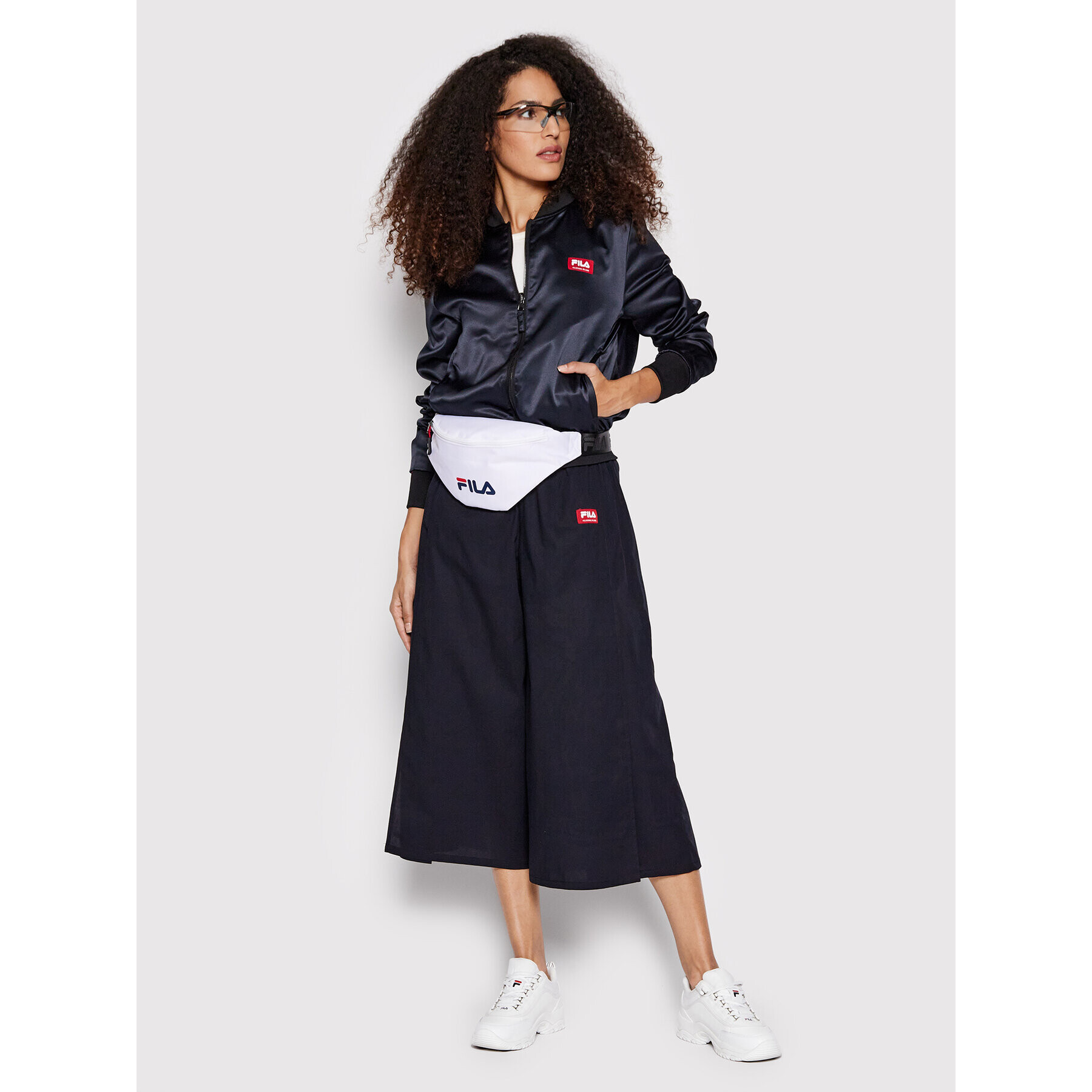 Fila Kalhoty culottes Terme FAW0015 Černá Relaxed Fit - Pepit.cz