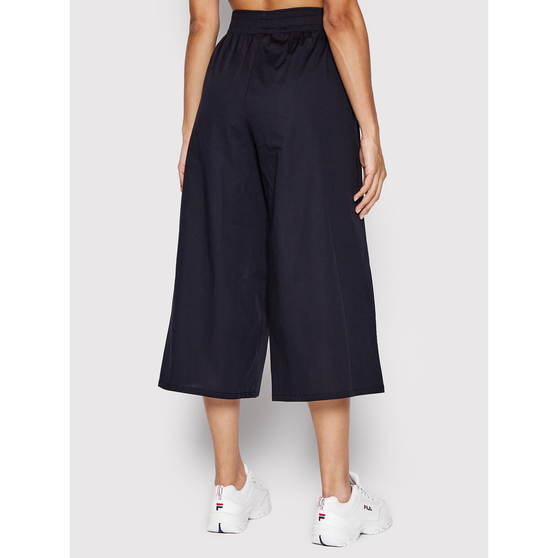 Fila Kalhoty culottes Terme FAW0015 Černá Relaxed Fit - Pepit.cz