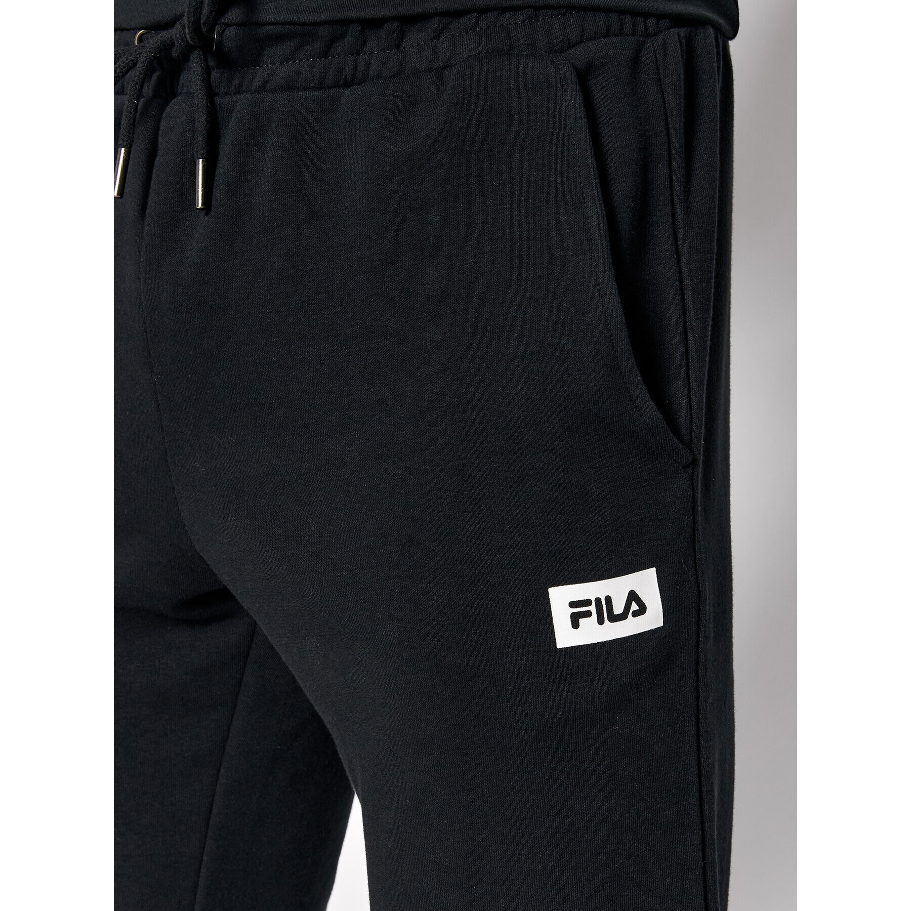 Fila Teplákové kalhoty Biorine FAM0085 Černá Regular Fit - Pepit.cz