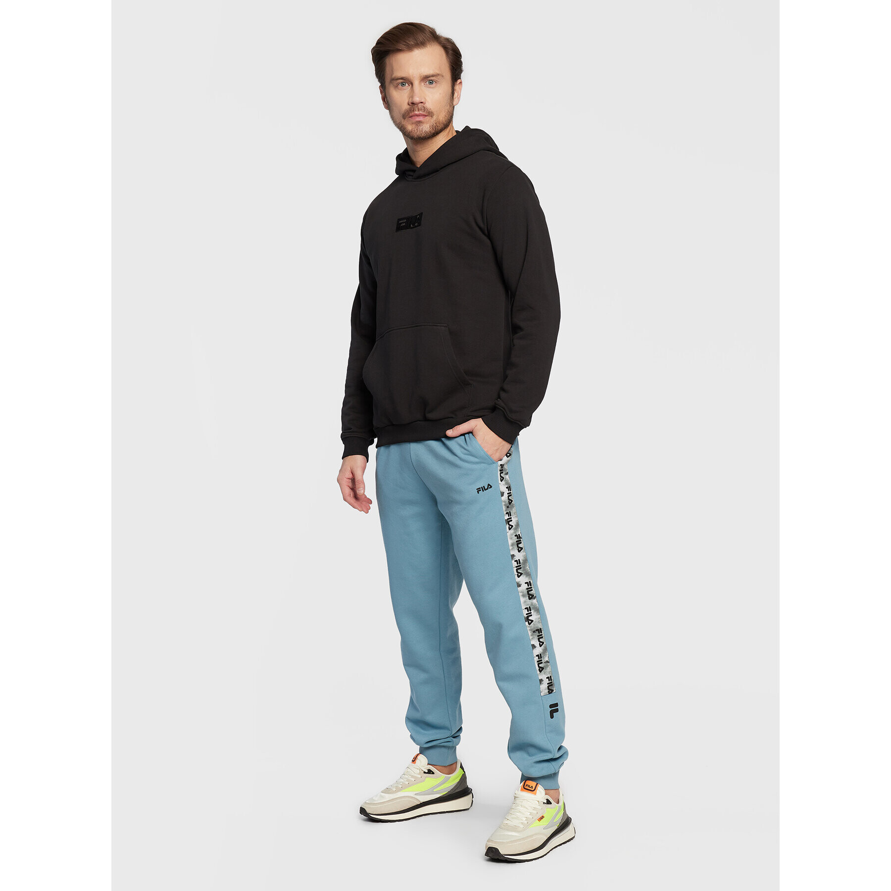 Fila Teplákové kalhoty Bottens FAM0192 Modrá Regular Fit - Pepit.cz