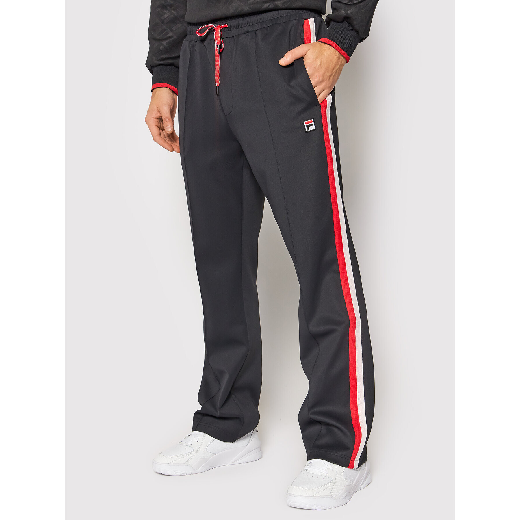 Fila Teplákové kalhoty Tauri 689170 Černá Regular Fit - Pepit.cz