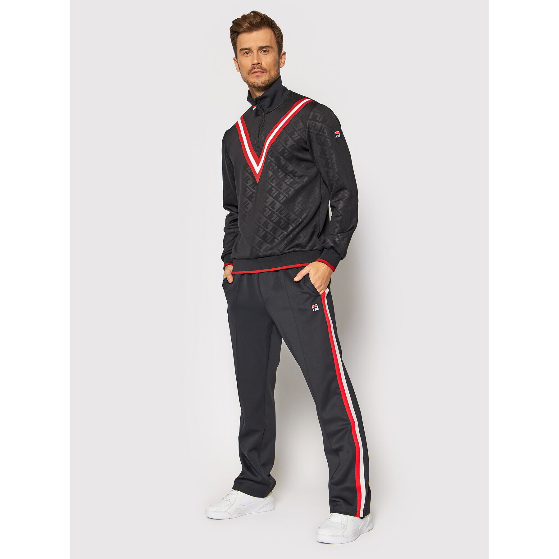 Fila Teplákové kalhoty Tauri 689170 Černá Regular Fit - Pepit.cz