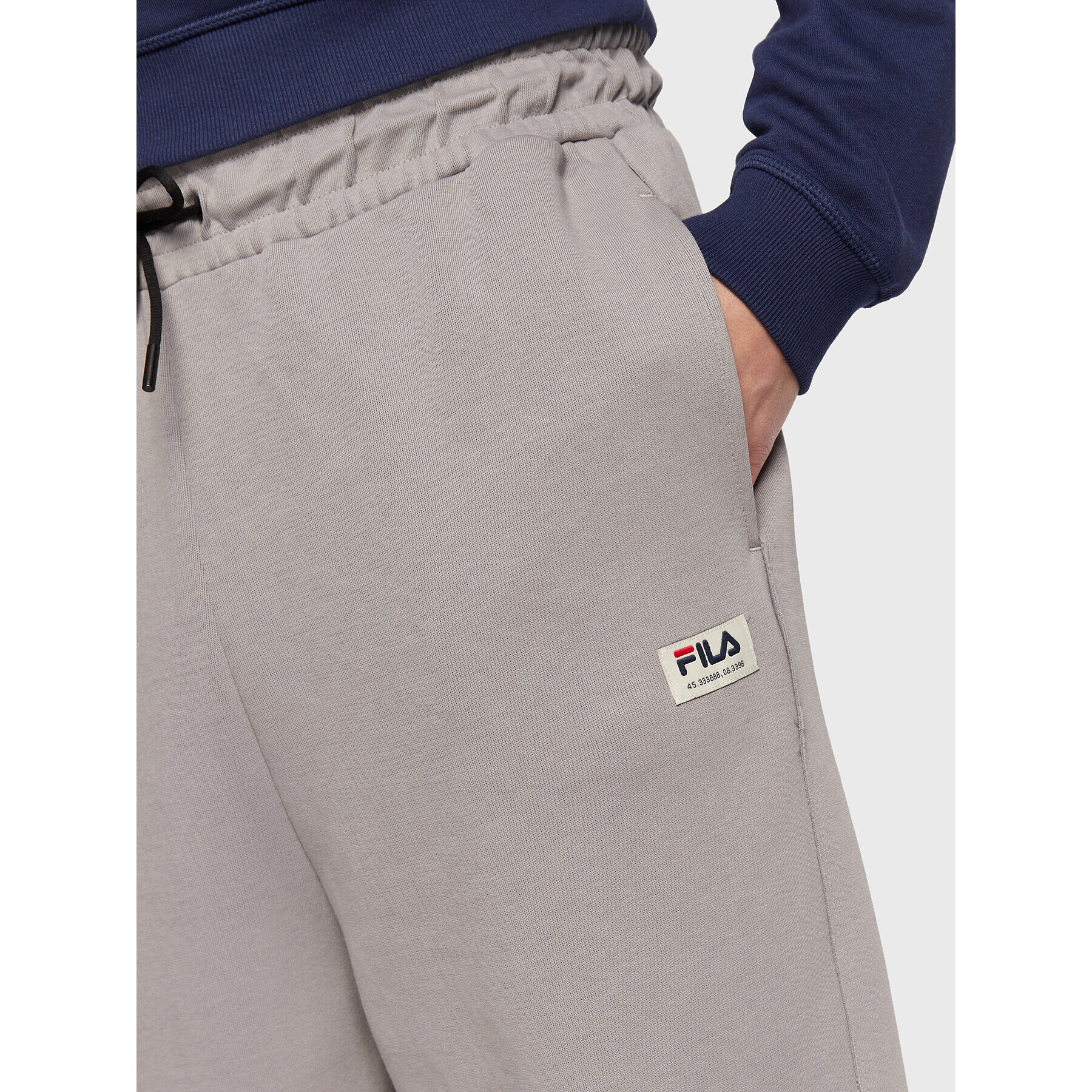 Fila Teplákové kalhoty Tricase FAM0153 Šedá Oversize - Pepit.cz