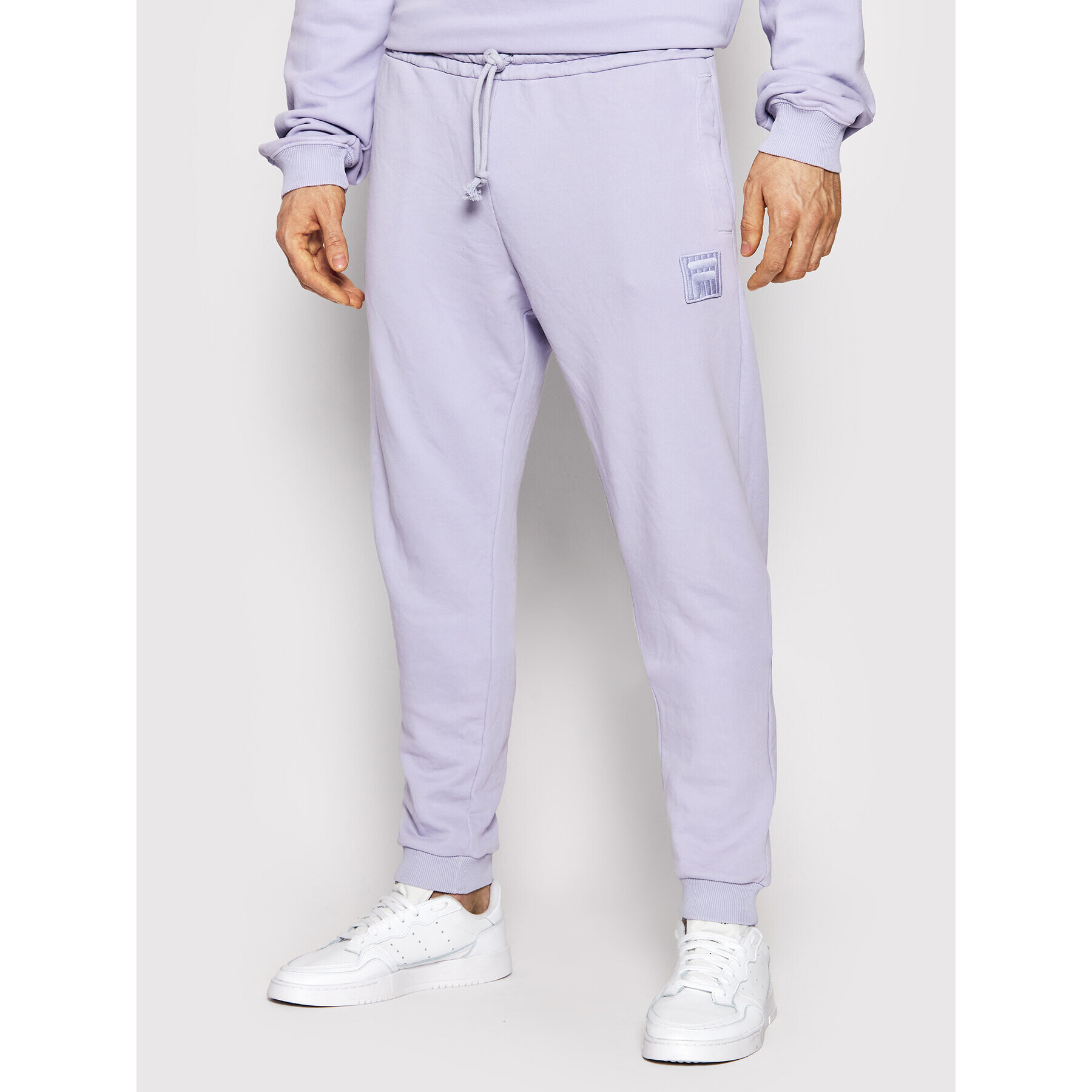 Fila Teplákové kalhoty Unisex Bastogne FAU0004 Fialová Regular Fit - Pepit.cz