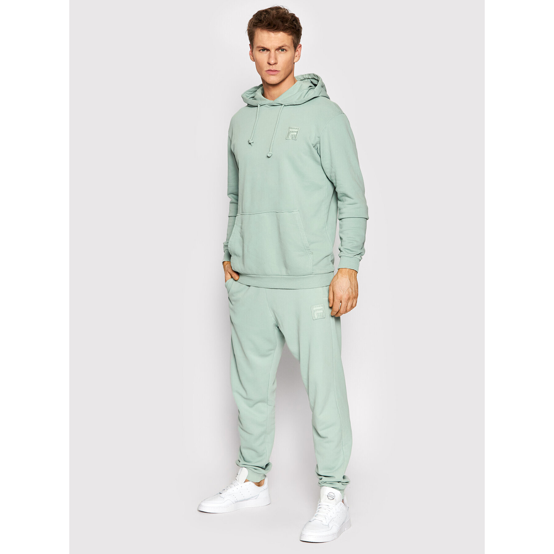 Fila Teplákové kalhoty Unisex Bastogne FAU0004 Zelená Regular Fit - Pepit.cz