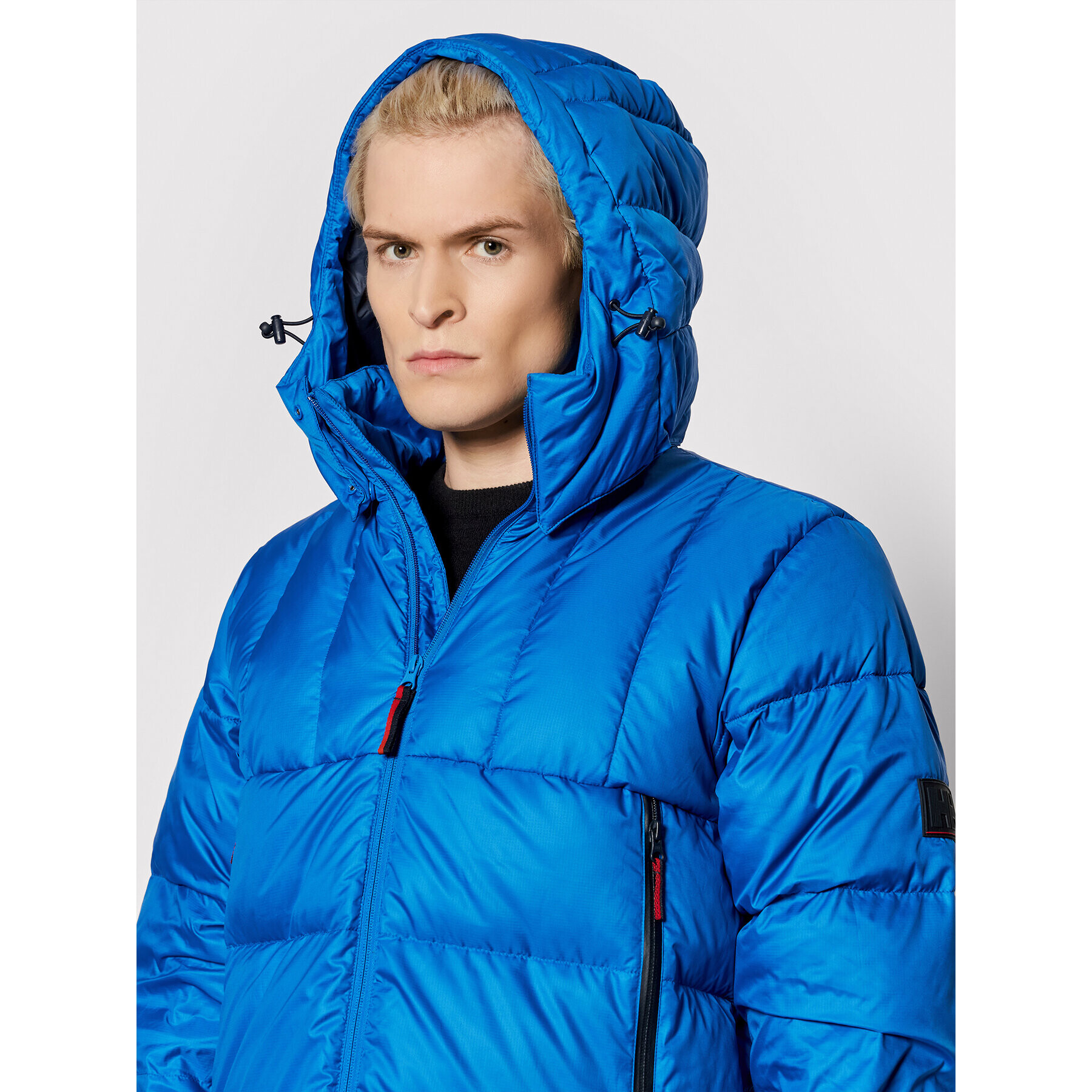 Helly Hansen Vatovaná bunda Veste Duvet 53641 Modrá Regular Fit - Pepit.cz