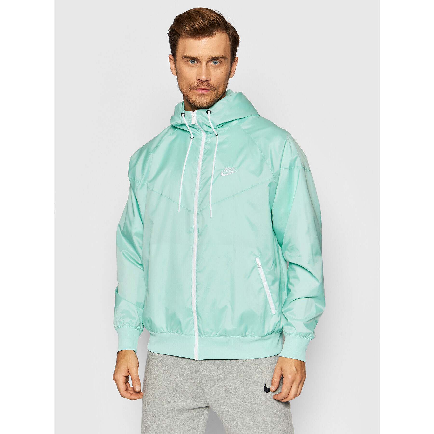 Nike Běžecká bunda Sportswear Windrunner DA0001 Zelená Standard Fit - Pepit.cz