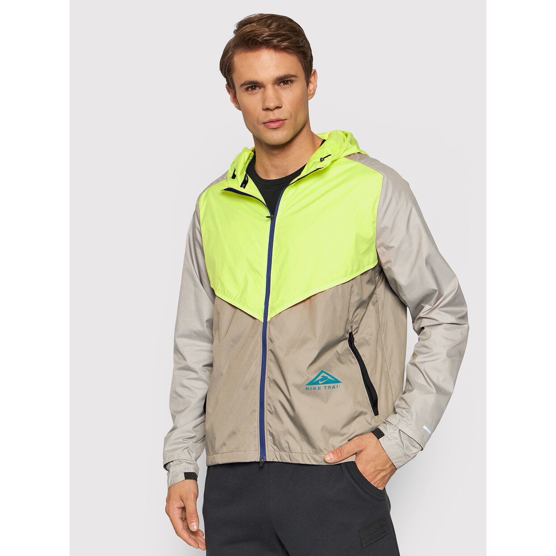 Nike Běžecká bunda Windrunner CZ9054 Béžová Standard Fit - Pepit.cz