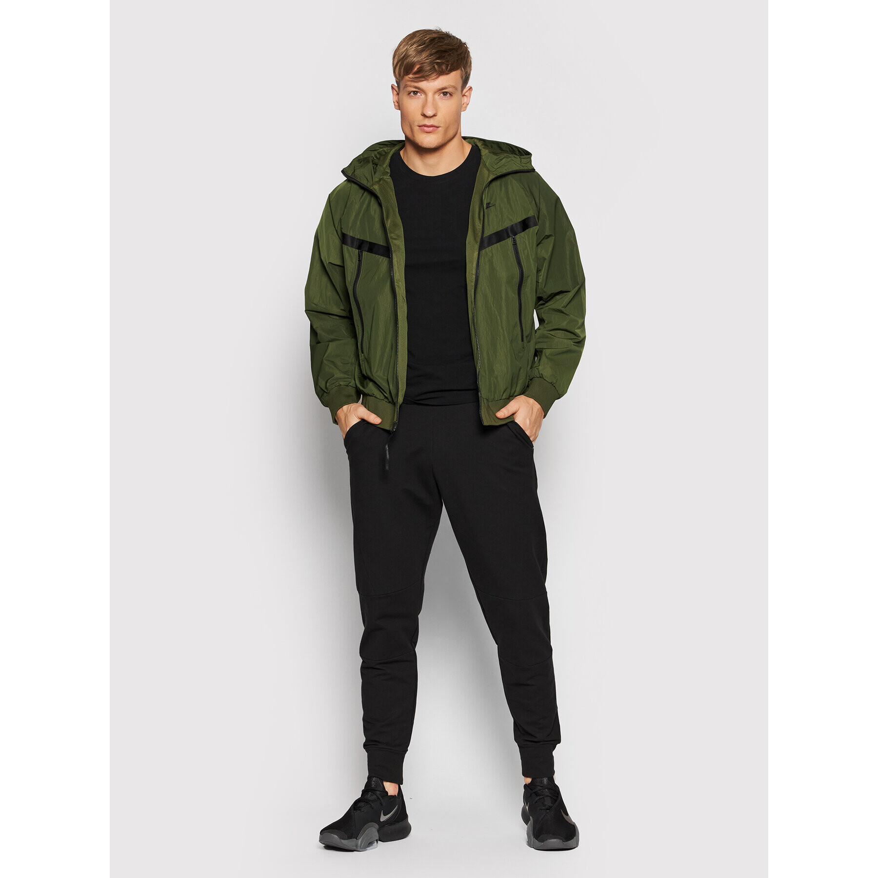 Nike Bunda pro přechodné období Premium Essentials DA7354 Zelená Regular Fit - Pepit.cz