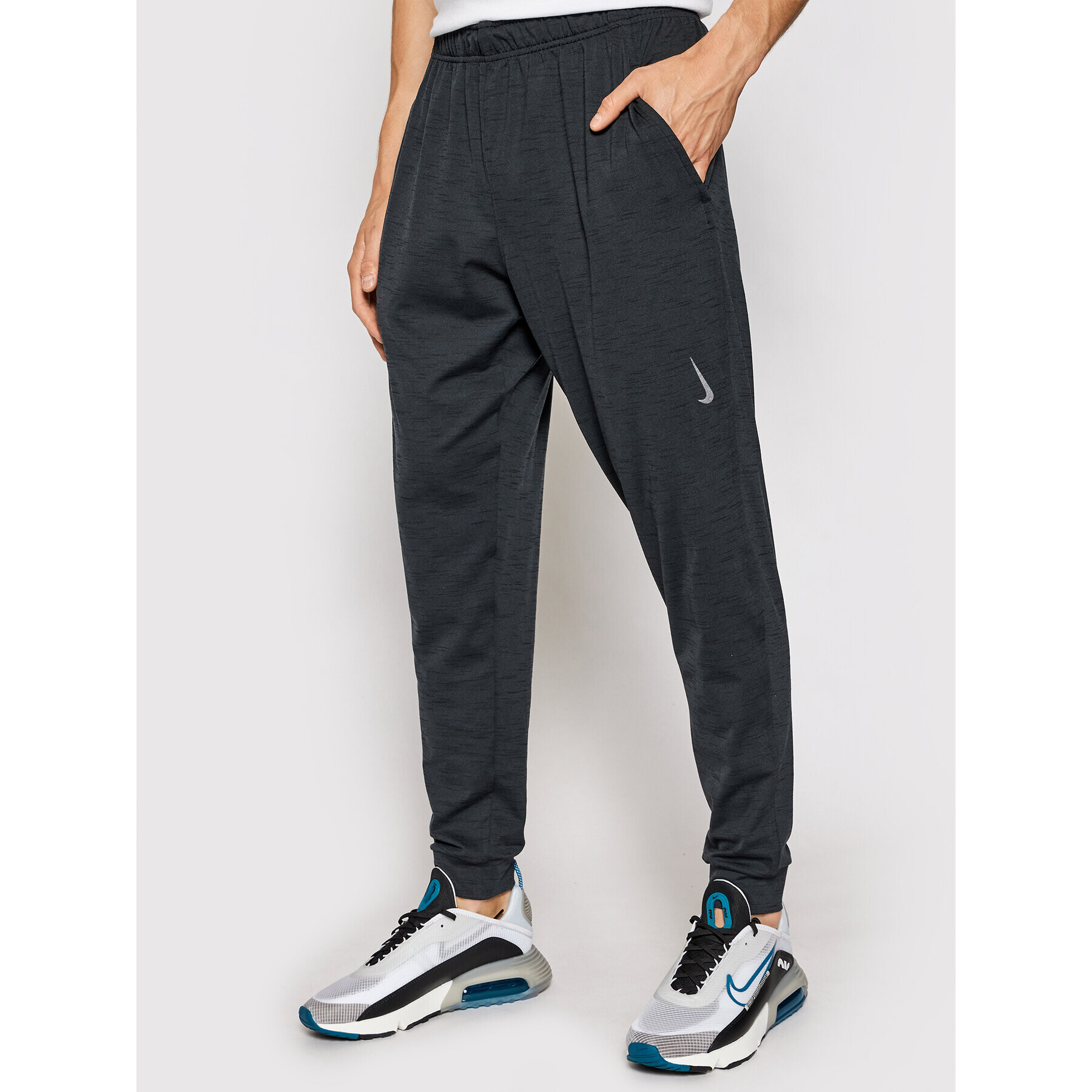 Nike Teplákové kalhoty Yoga Dri-FIT CZ2208 Šedá Standard Fit - Pepit.cz