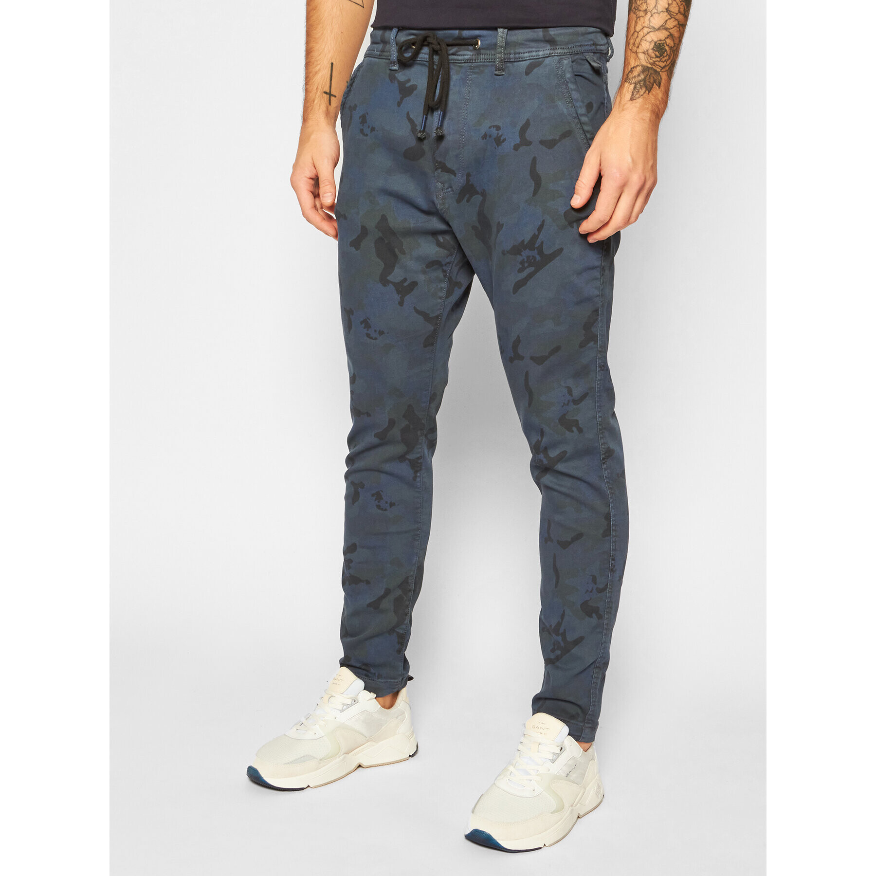 Pepe Jeans Joggers kalhoty GYMDIGO Johnson Knit PM211367 Tmavomodrá Relaxed Fit - Pepit.cz