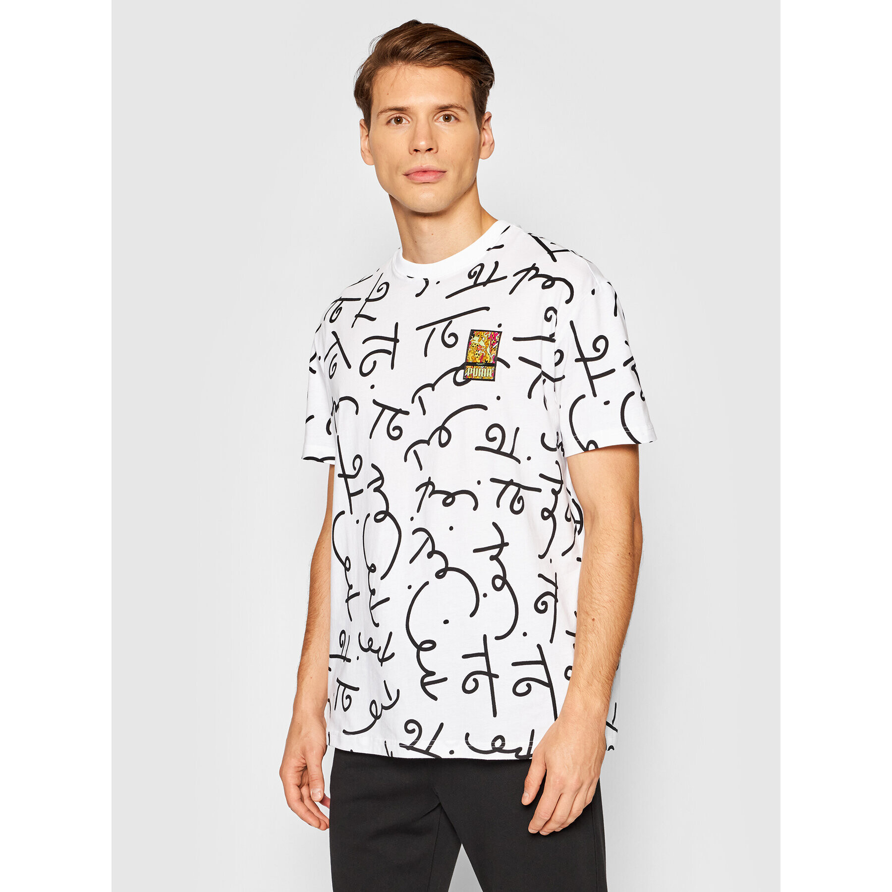 Puma T-Shirt BRITTO Aop 532235 Bílá Relaxed Fit - Pepit.cz