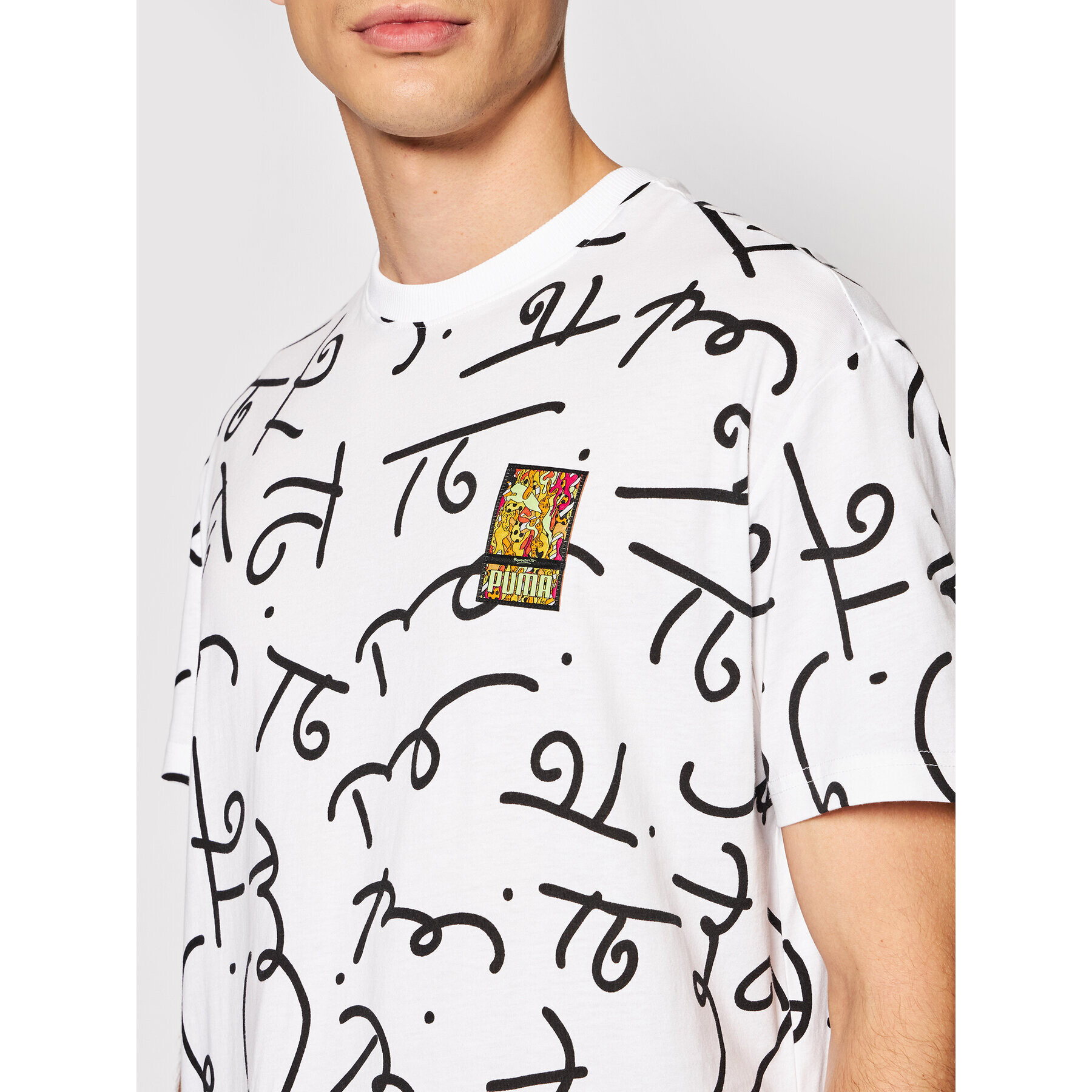 Puma T-Shirt BRITTO Aop 532235 Bílá Relaxed Fit - Pepit.cz