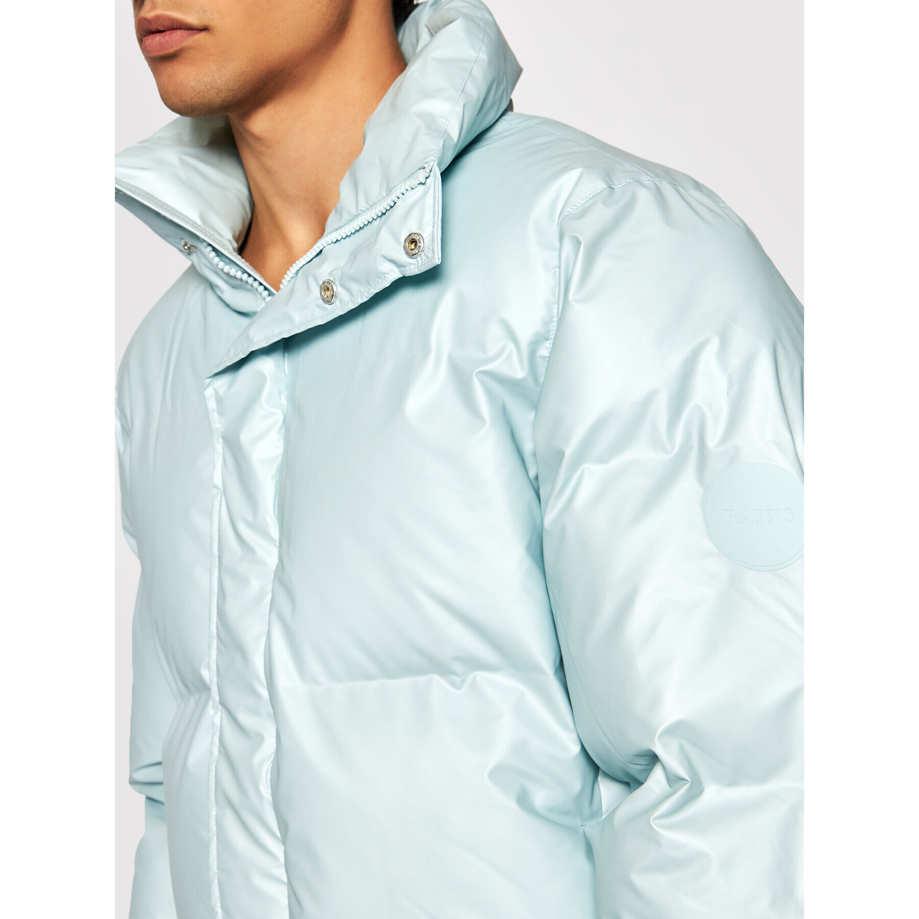 Rains Vatovaná bunda Unisex 1522 Modrá Boxy Fit - Pepit.cz