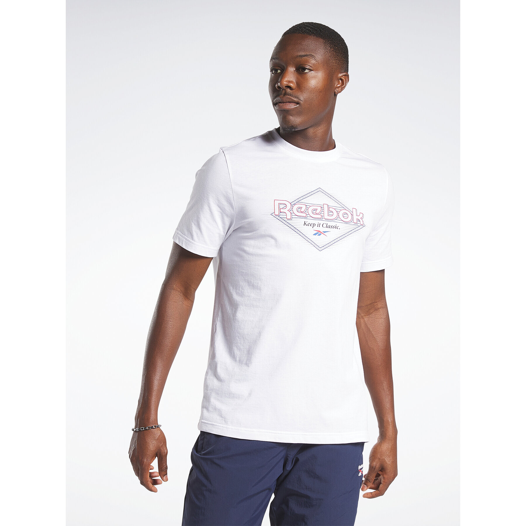 Reebok T-Shirt Graphic Series T-Shirt HM6251 Bílá Regular Fit - Pepit.cz