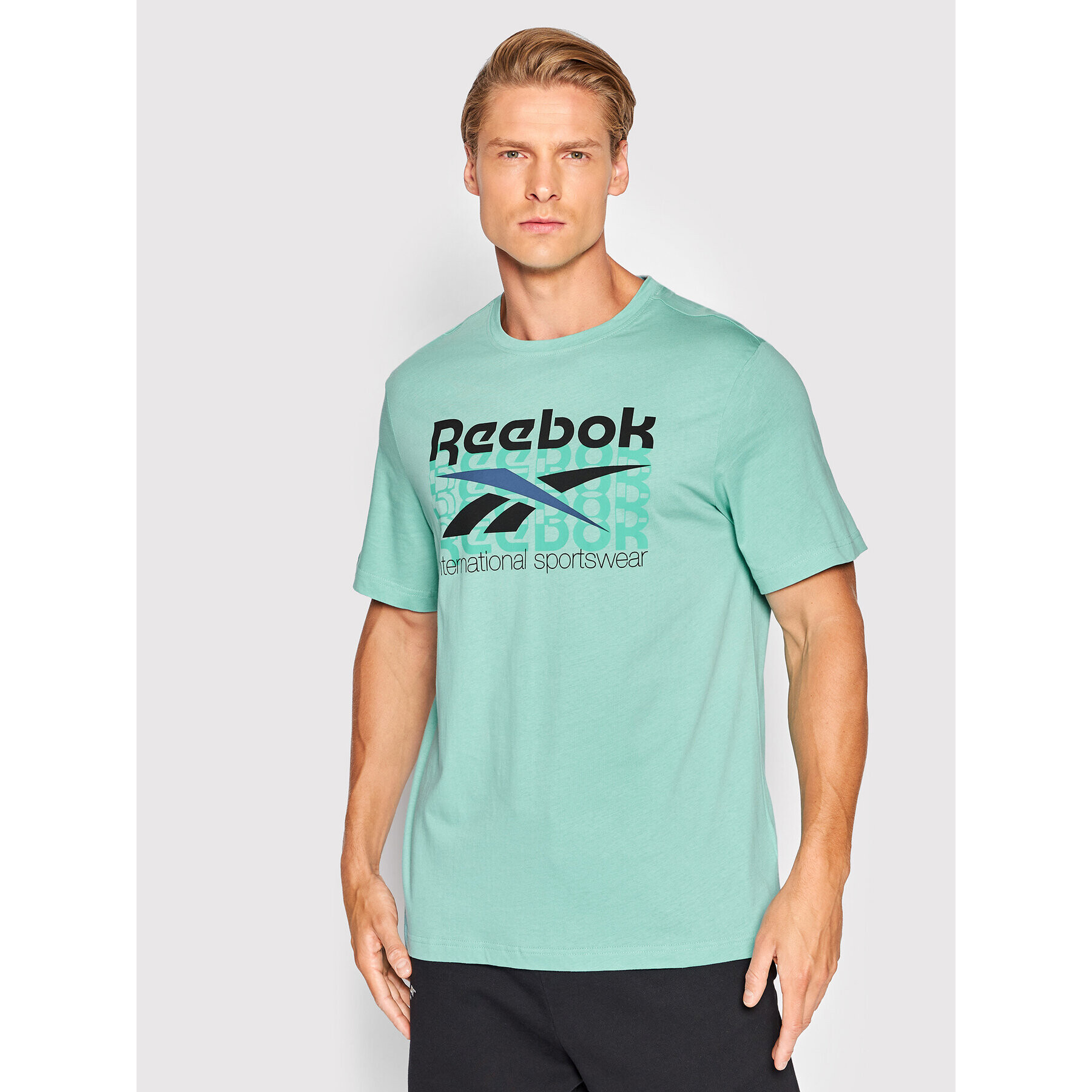 Reebok T-Shirt International Sportswear HH7381 Modrá Regular Fit - Pepit.cz