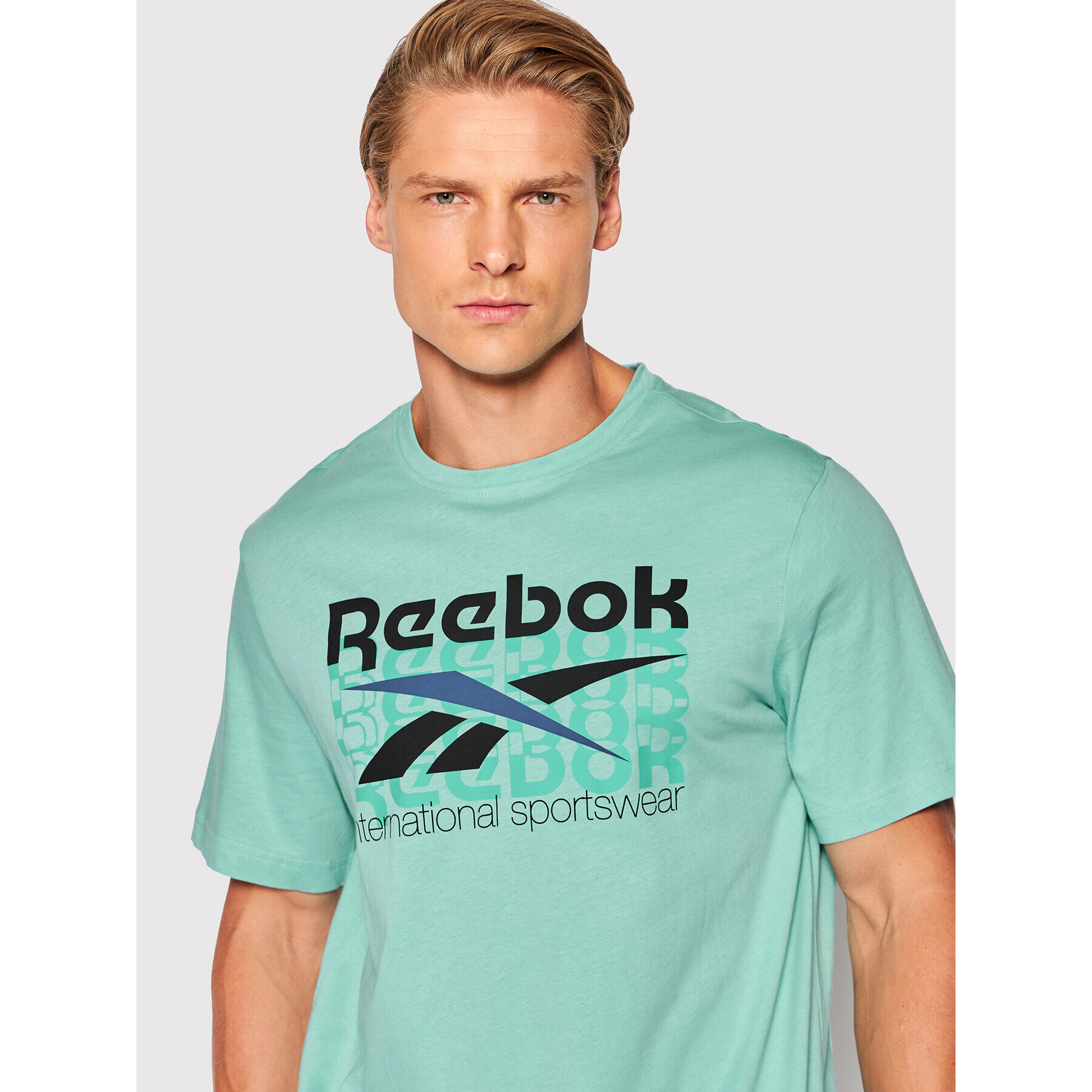 Reebok T-Shirt International Sportswear HH7381 Modrá Regular Fit - Pepit.cz