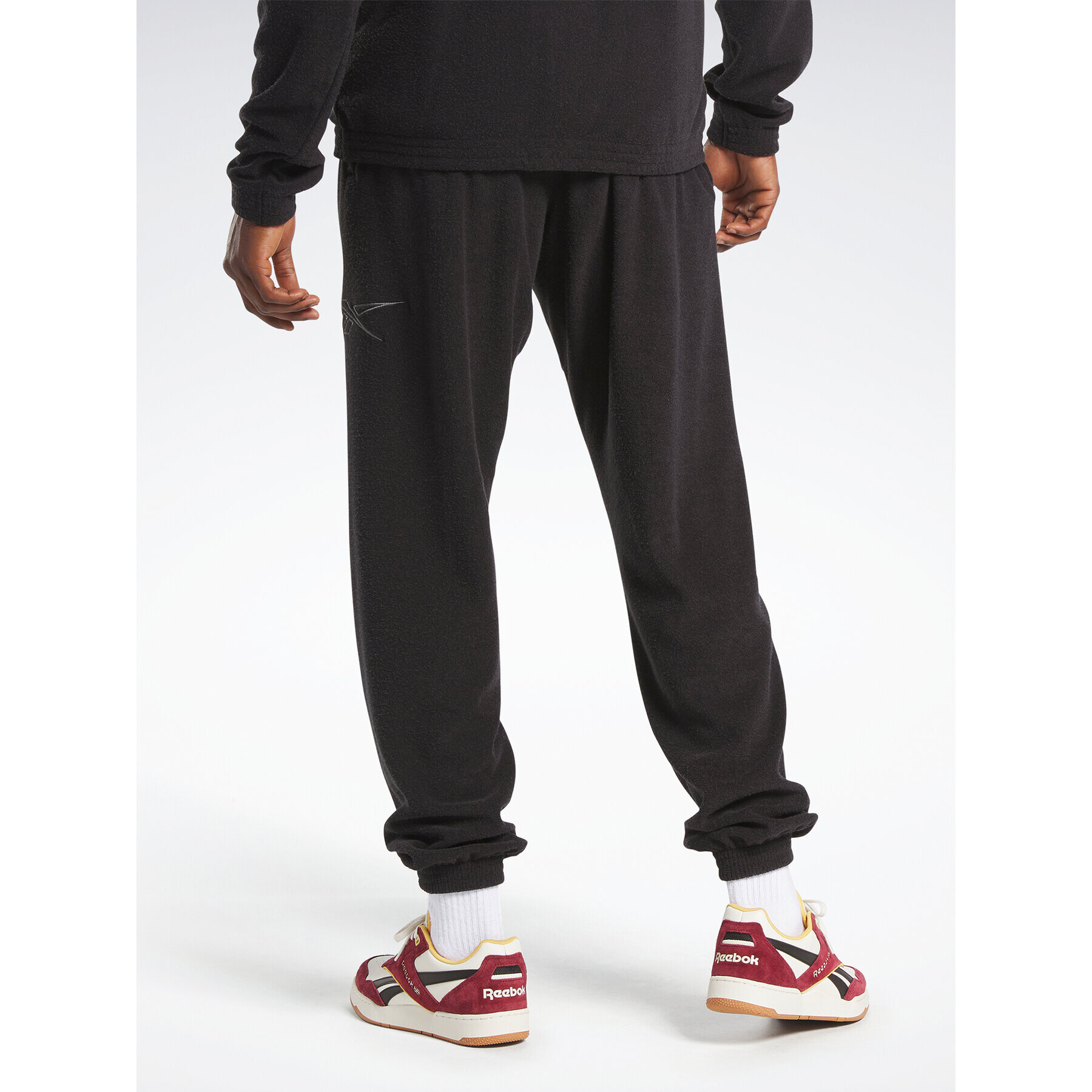 Reebok Teplákové kalhoty Basketball Court Top Joggers IA2426 Černá Regular Fit - Pepit.cz