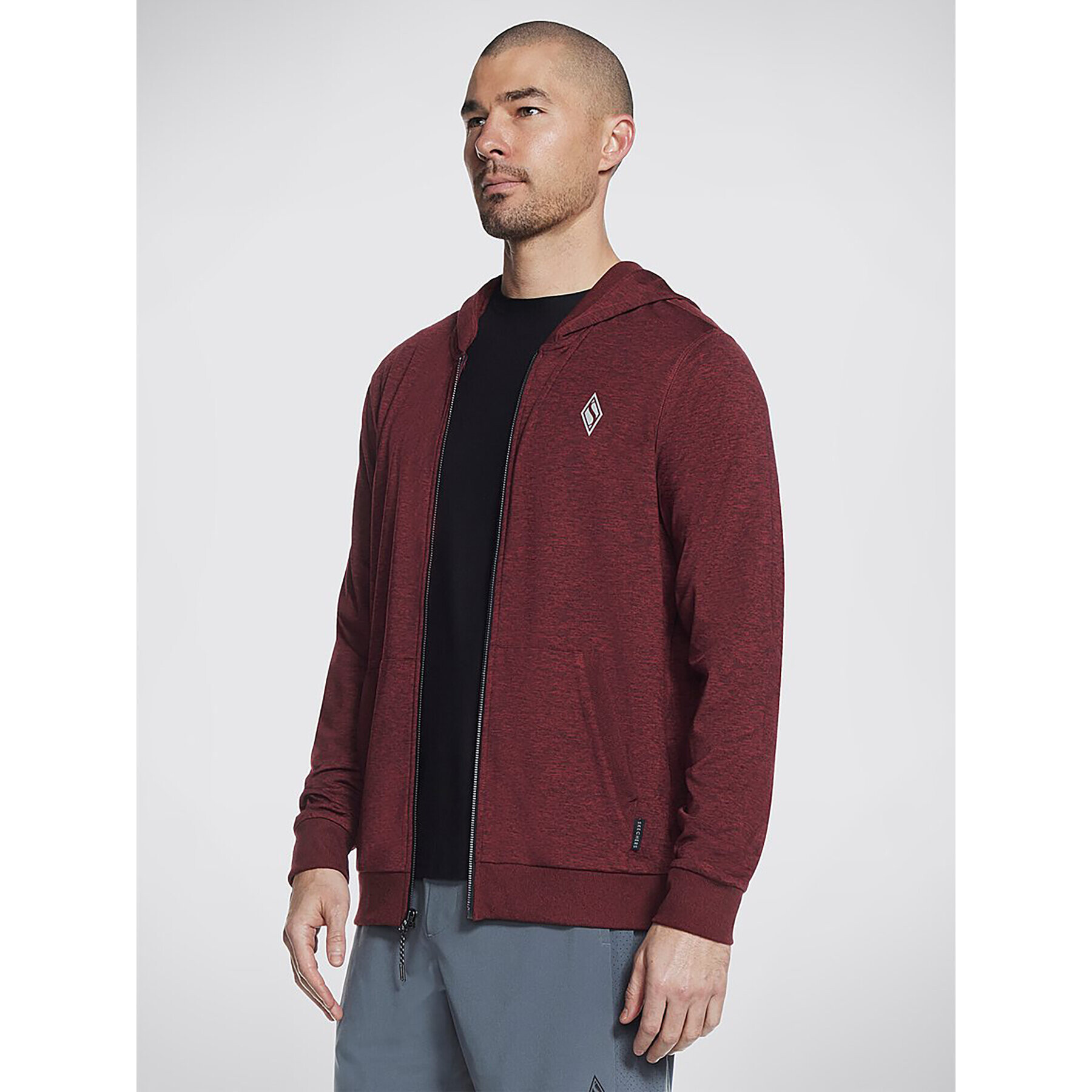 Skechers Bunda pro přechodné období Knits Ultra Go Full Zip Hoodie JA26 Červená Regular Fit - Pepit.cz