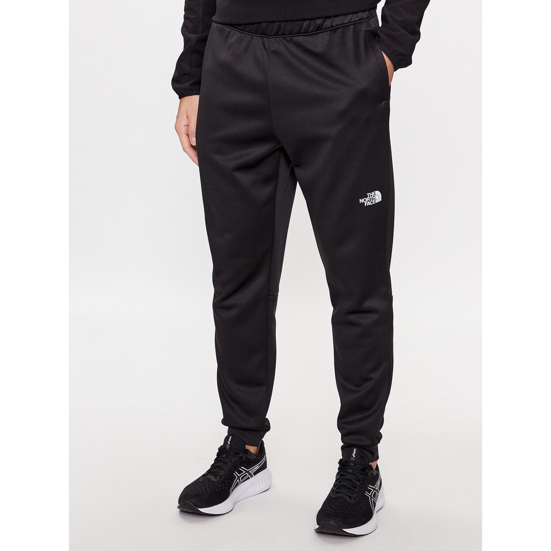 The North Face Teplákové kalhoty M Reaxion Fleece Jogger - EuNF0A7Z9PJK31 Černá Regular Fit - Pepit.cz