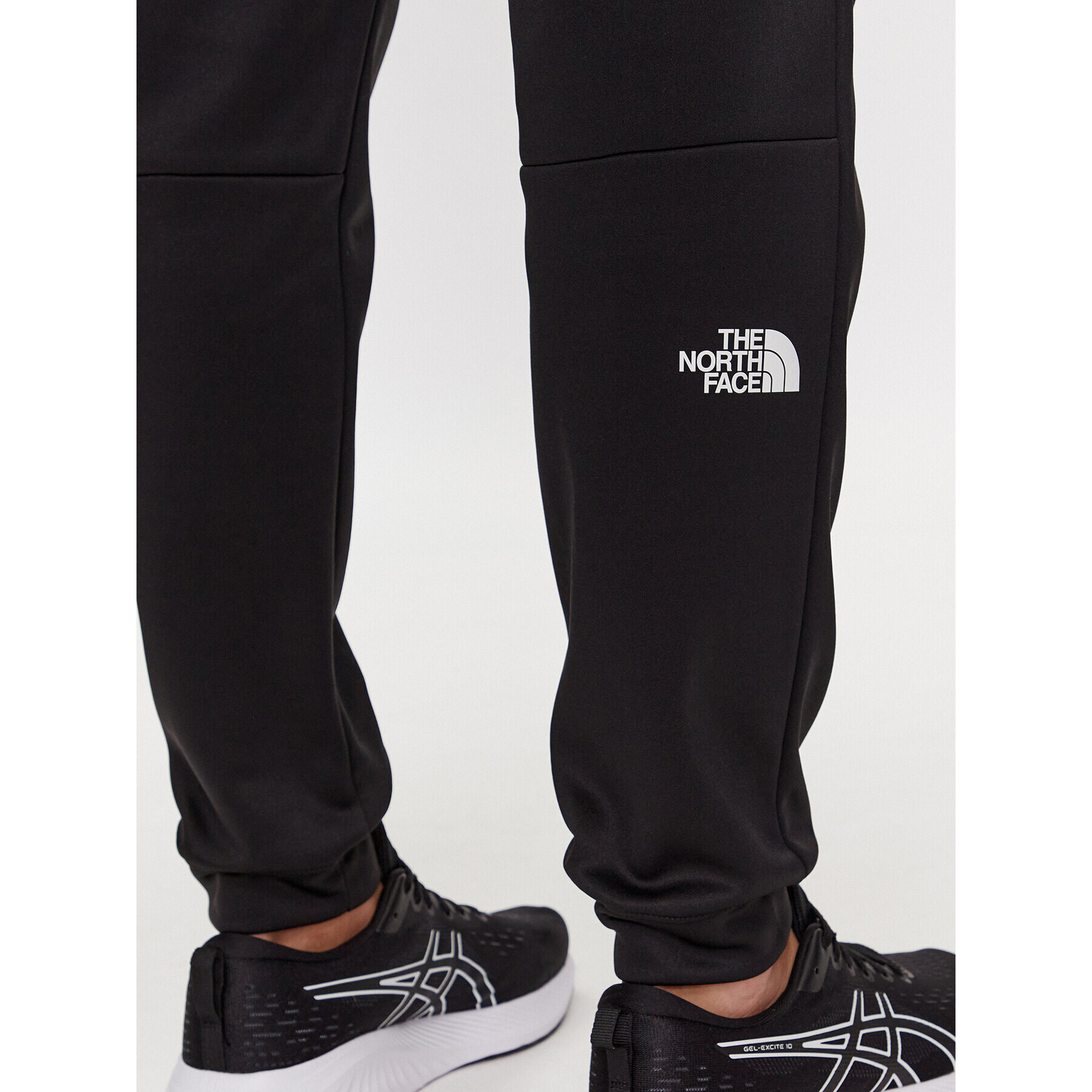 The North Face Teplákové kalhoty M Reaxion Fleece Jogger - EuNF0A7Z9PJK31 Černá Regular Fit - Pepit.cz