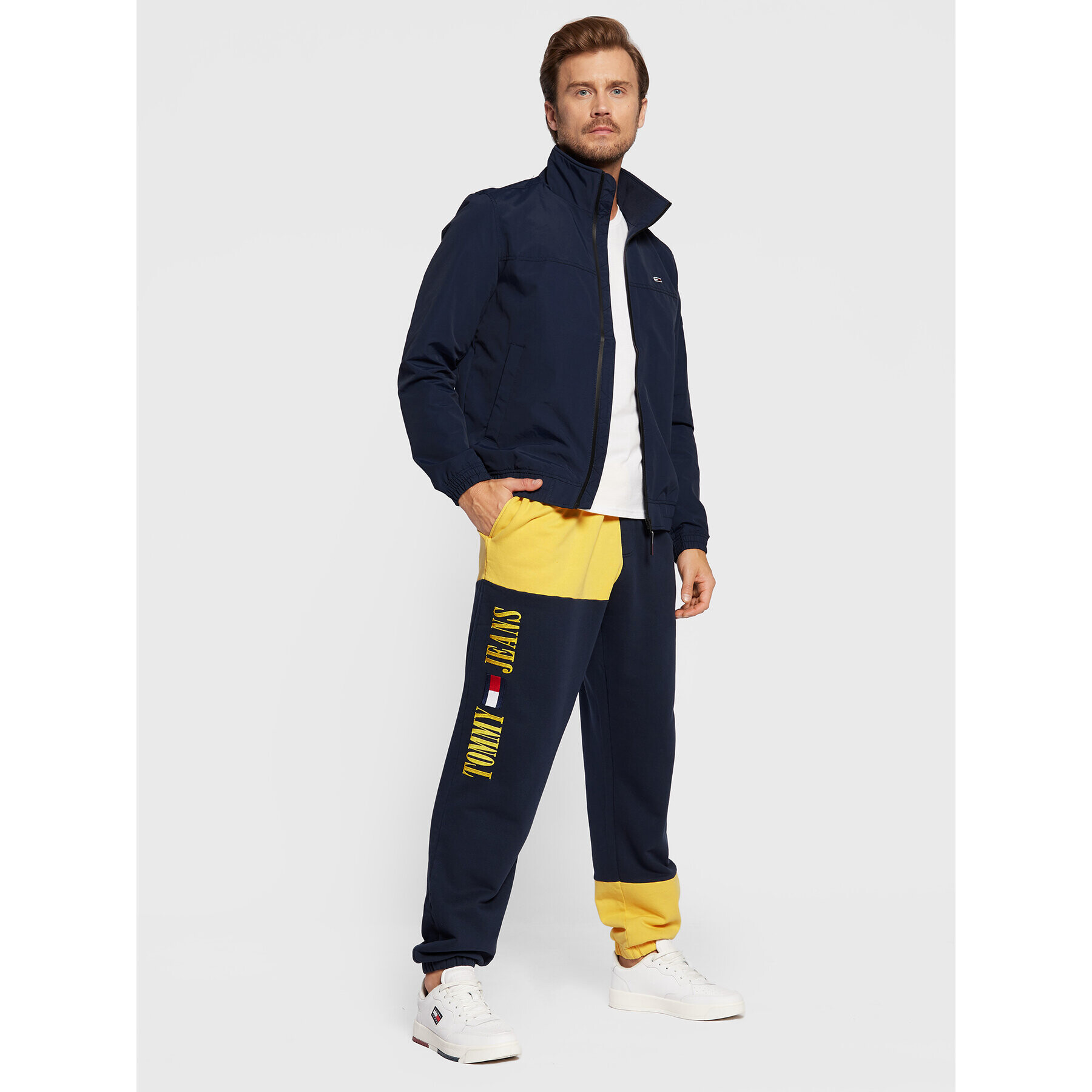 Tommy Hilfiger Teplákové kalhoty Colorblock DM0DM14952 Tmavomodrá Relaxed Fit - Pepit.cz