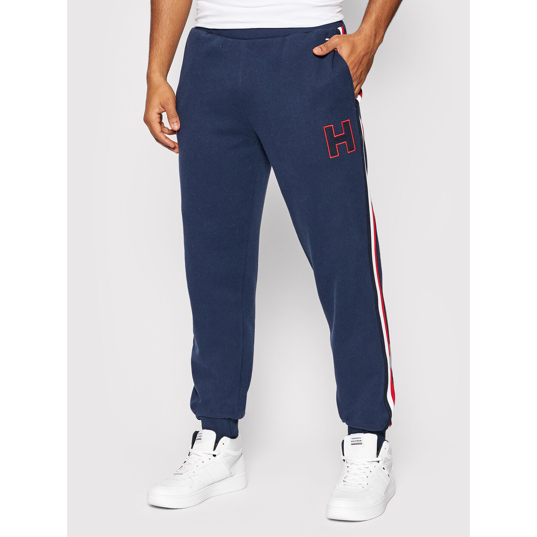 Tommy Hilfiger Teplákové kalhoty Hwk UM0UM02353 Tmavomodrá Regular Fit - Pepit.cz