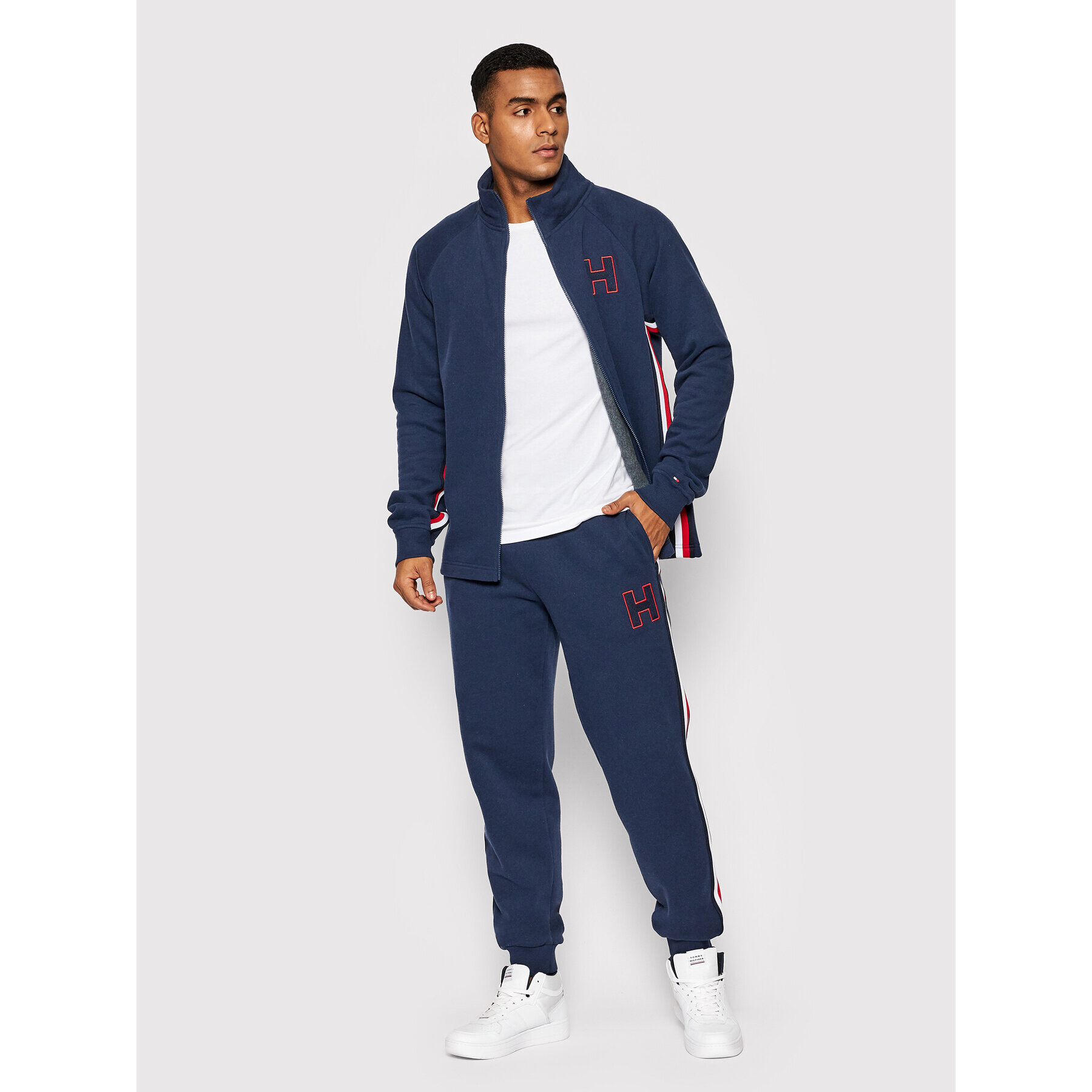 Tommy Hilfiger Teplákové kalhoty Hwk UM0UM02353 Tmavomodrá Regular Fit - Pepit.cz