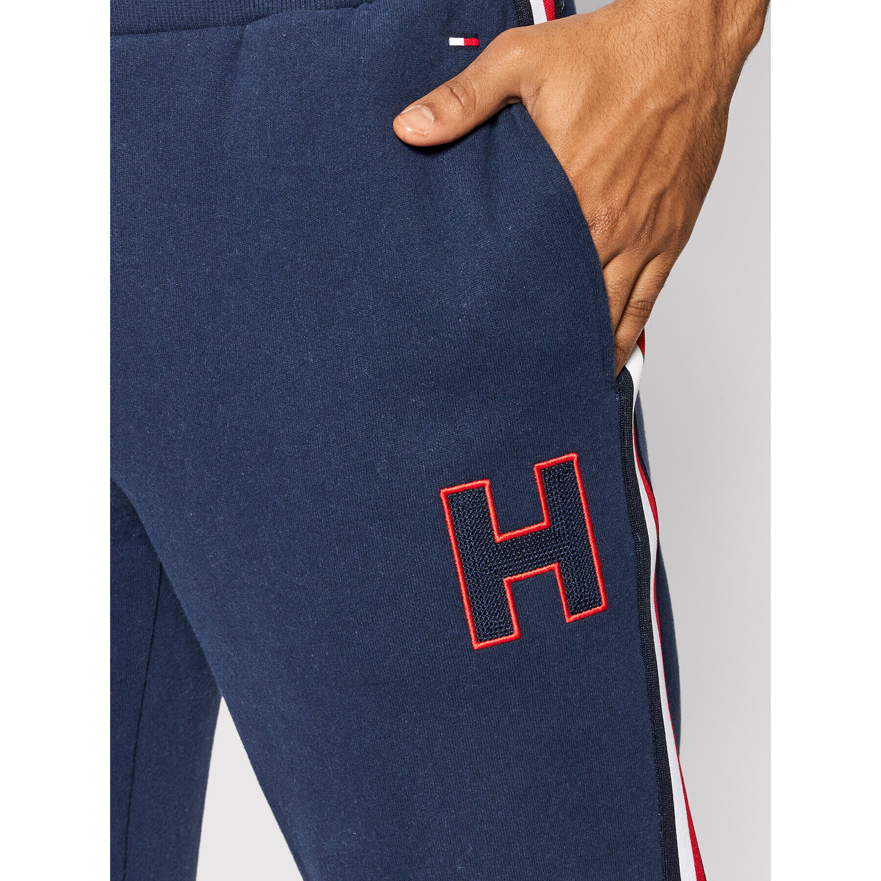 Tommy Hilfiger Teplákové kalhoty Hwk UM0UM02353 Tmavomodrá Regular Fit - Pepit.cz