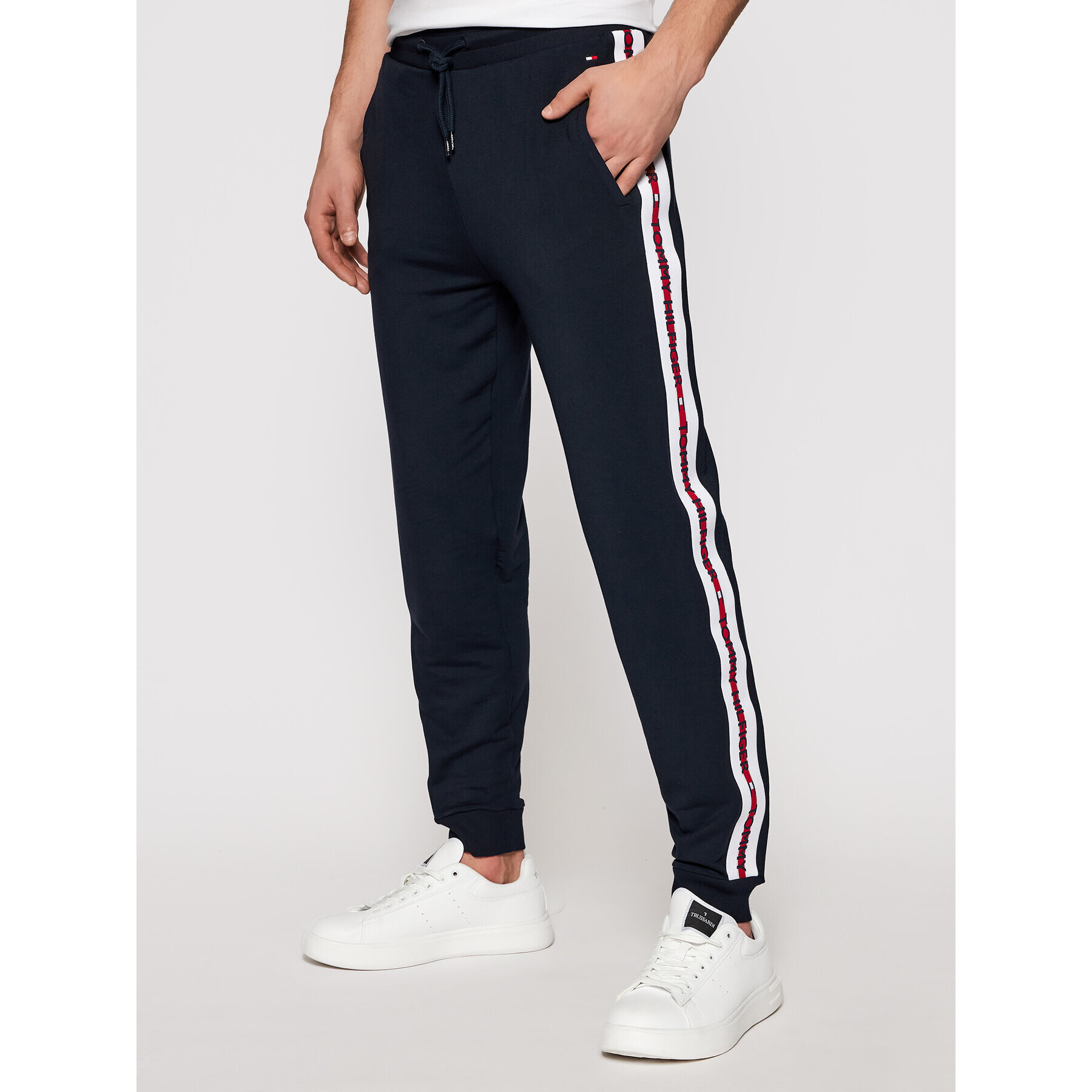 Tommy Hilfiger Teplákové kalhoty Repeat Logo UM0UM01918 Tmavomodrá Regular Fit - Pepit.cz