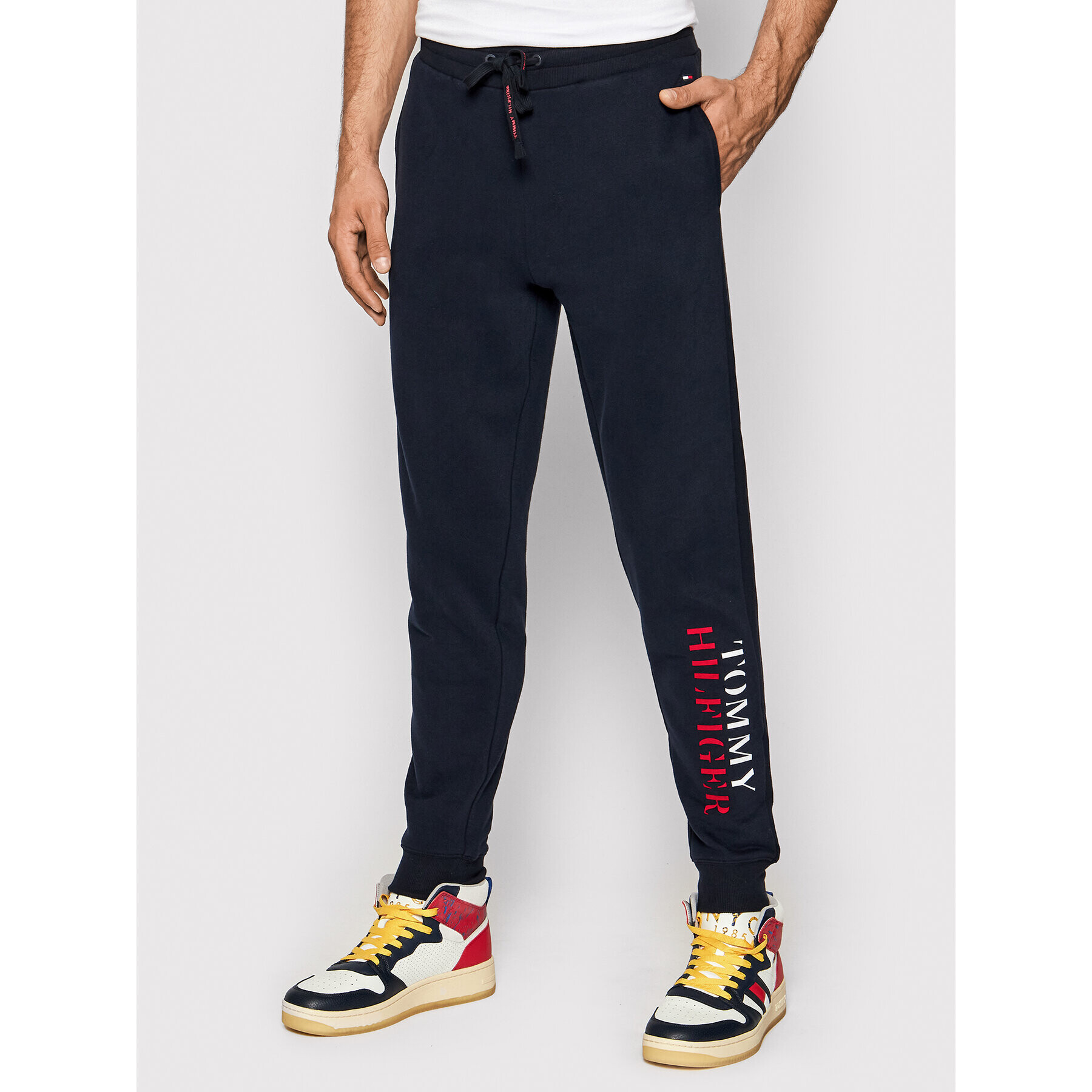 Tommy Hilfiger Teplákové kalhoty UM0UM02360 Tmavomodrá Slim Fit - Pepit.cz