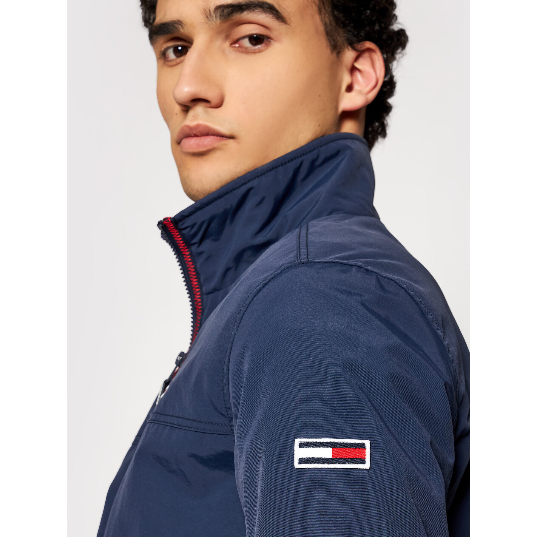 Tommy Jeans Bunda pro přechodné období Essential Casual DM0DM10061 Tmavomodrá Regular Fit - Pepit.cz