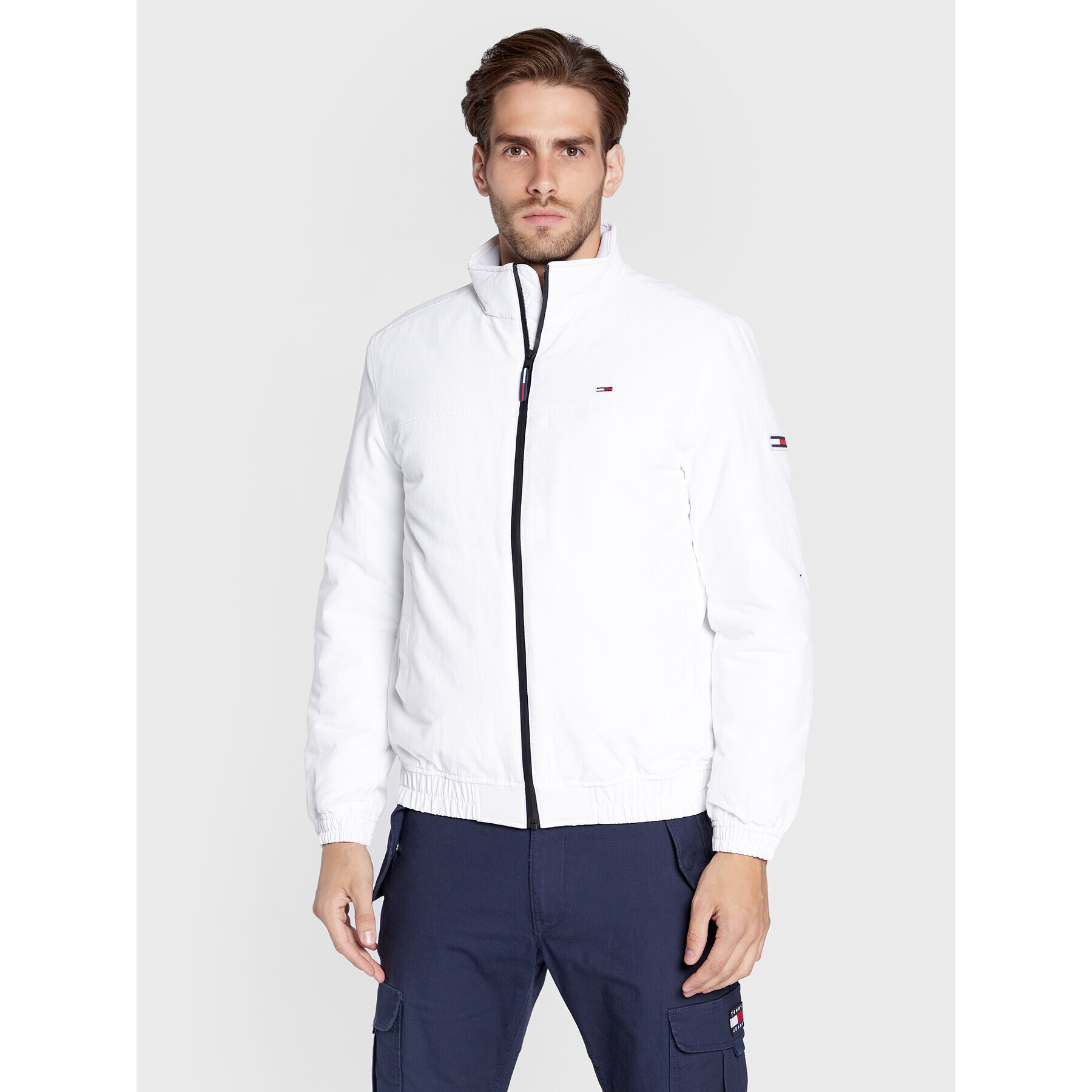 Tommy Jeans Bunda pro přechodné období Essential DM0DM14454 Bílá Regular Fit - Pepit.cz