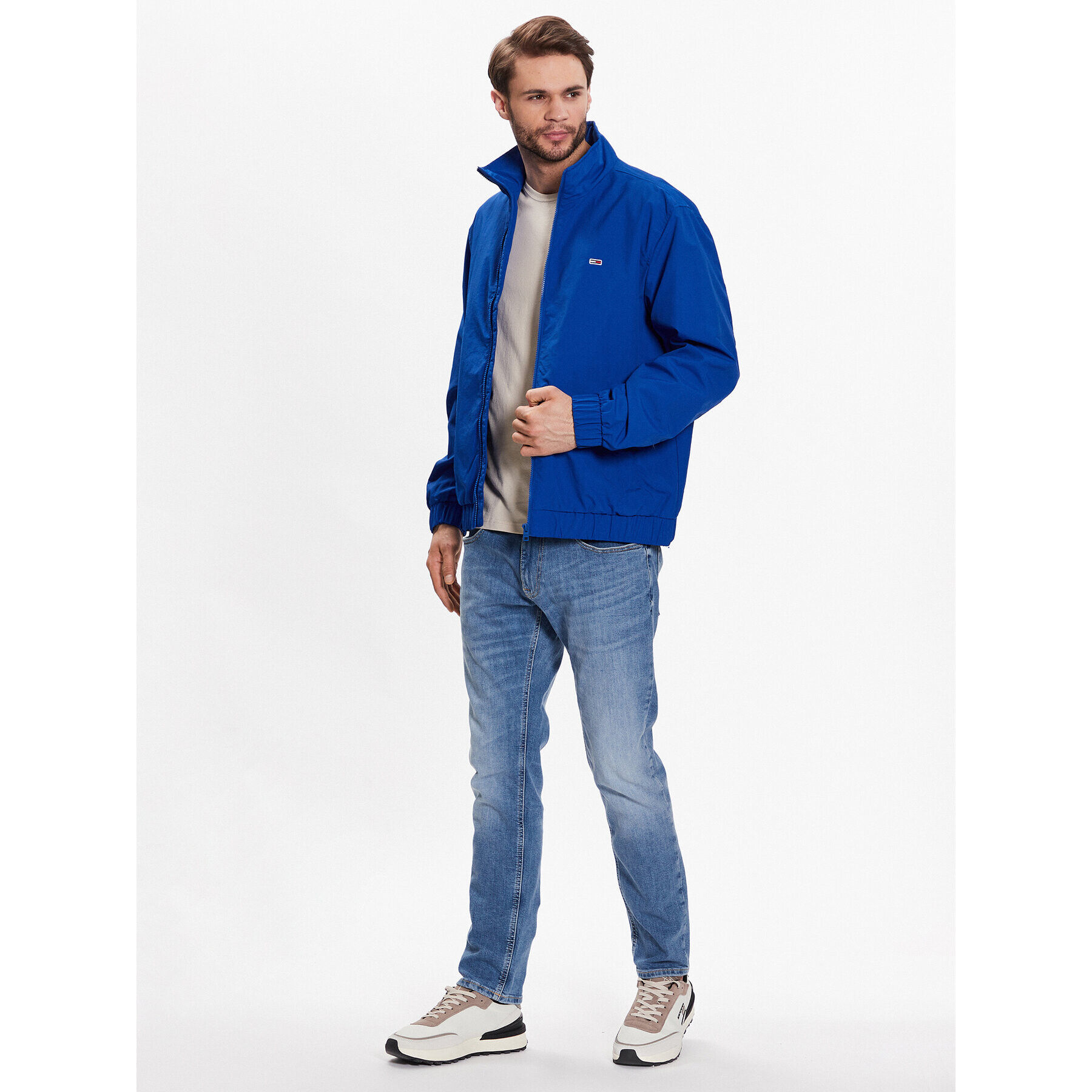 Tommy Jeans Bunda pro přechodné období Essential DM0DM15916 Modrá Regular Fit - Pepit.cz