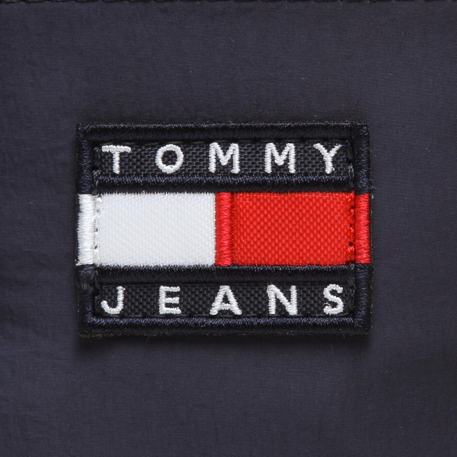 Tommy Jeans Pouzdro na mobil Tjm Heritage Phone P W/Lanyard AM0AM10647 Tmavomodrá - Pepit.cz