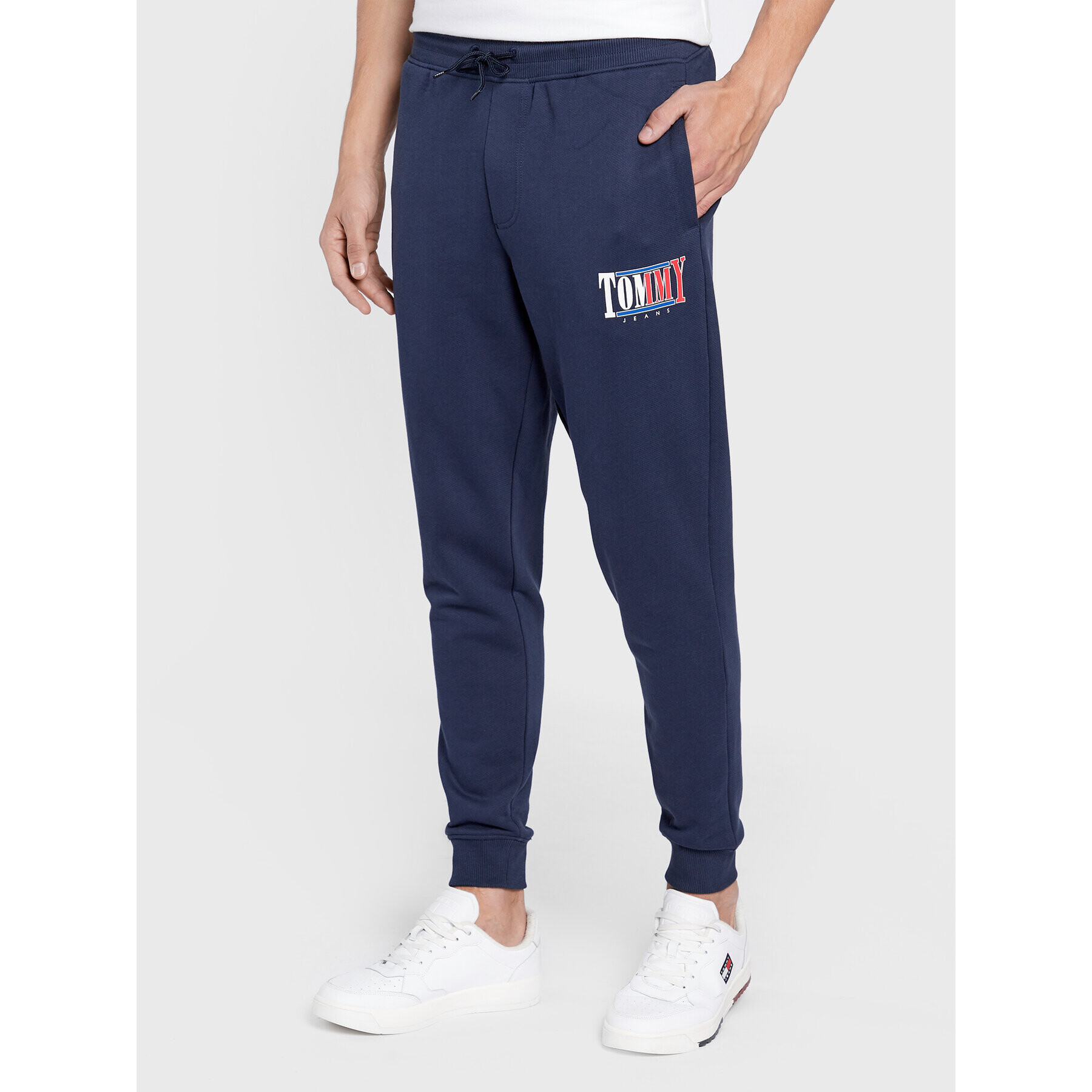 Tommy Jeans Teplákové kalhoty Essential Graphic DM0DM15031 Tmavomodrá Slim Fit - Pepit.cz