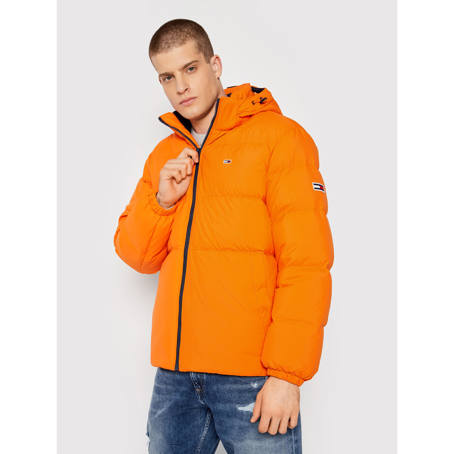 Tommy Jeans Vatovaná bunda Essential DM0DM12171 Oranžová Regular Fit - Pepit.cz