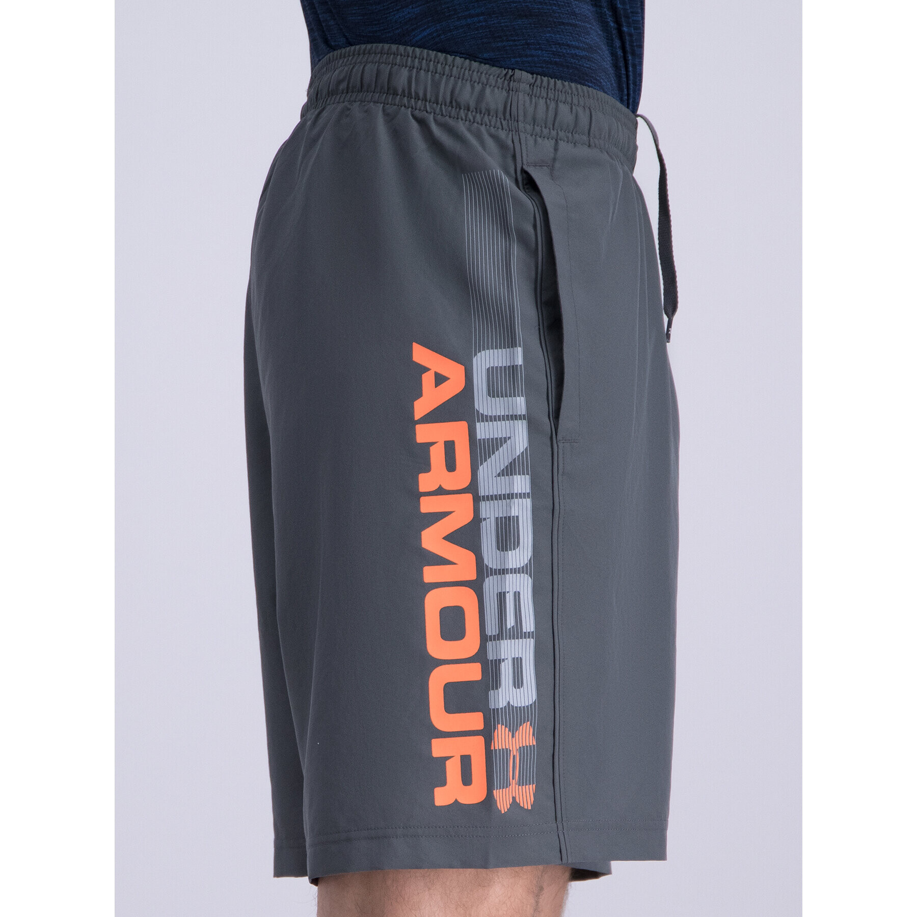 Under Armour Sportovní kraťasy UA Woven Graphic Wordmark 1320203 Šedá Regular Fit - Pepit.cz