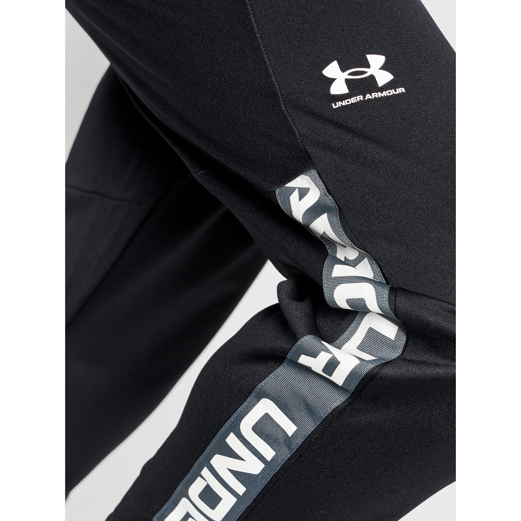 Under Armour Teplákové kalhoty Ua Tricot Track 1366209 Černá Loose Fit - Pepit.cz