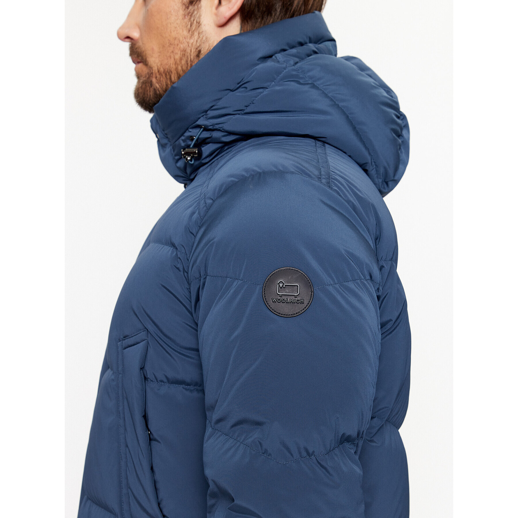 Woolrich Vatovaná bunda Premium CFWOOU0775MRUT3515 Tmavomodrá Regular Fit - Pepit.cz